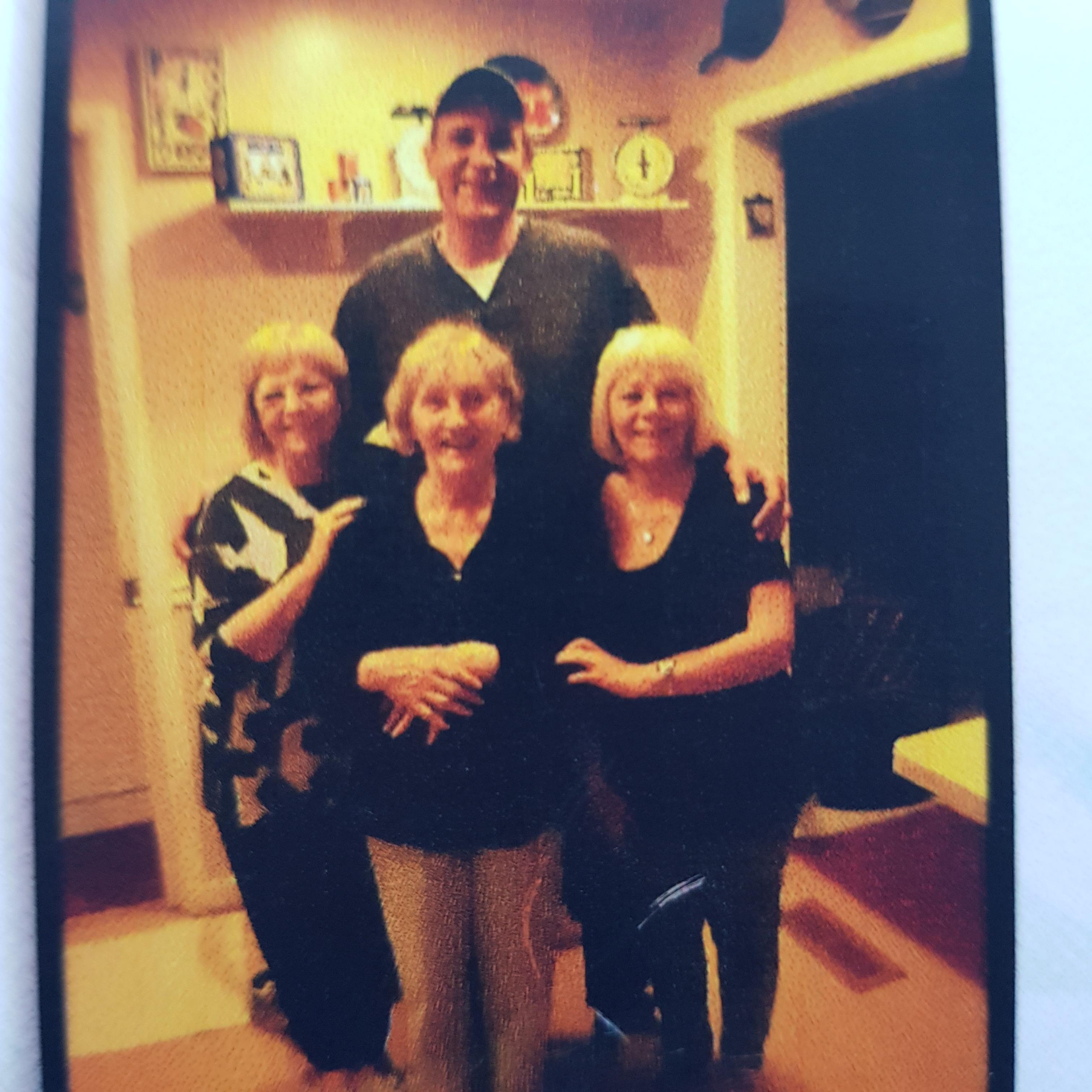 A group of people posing for a photo