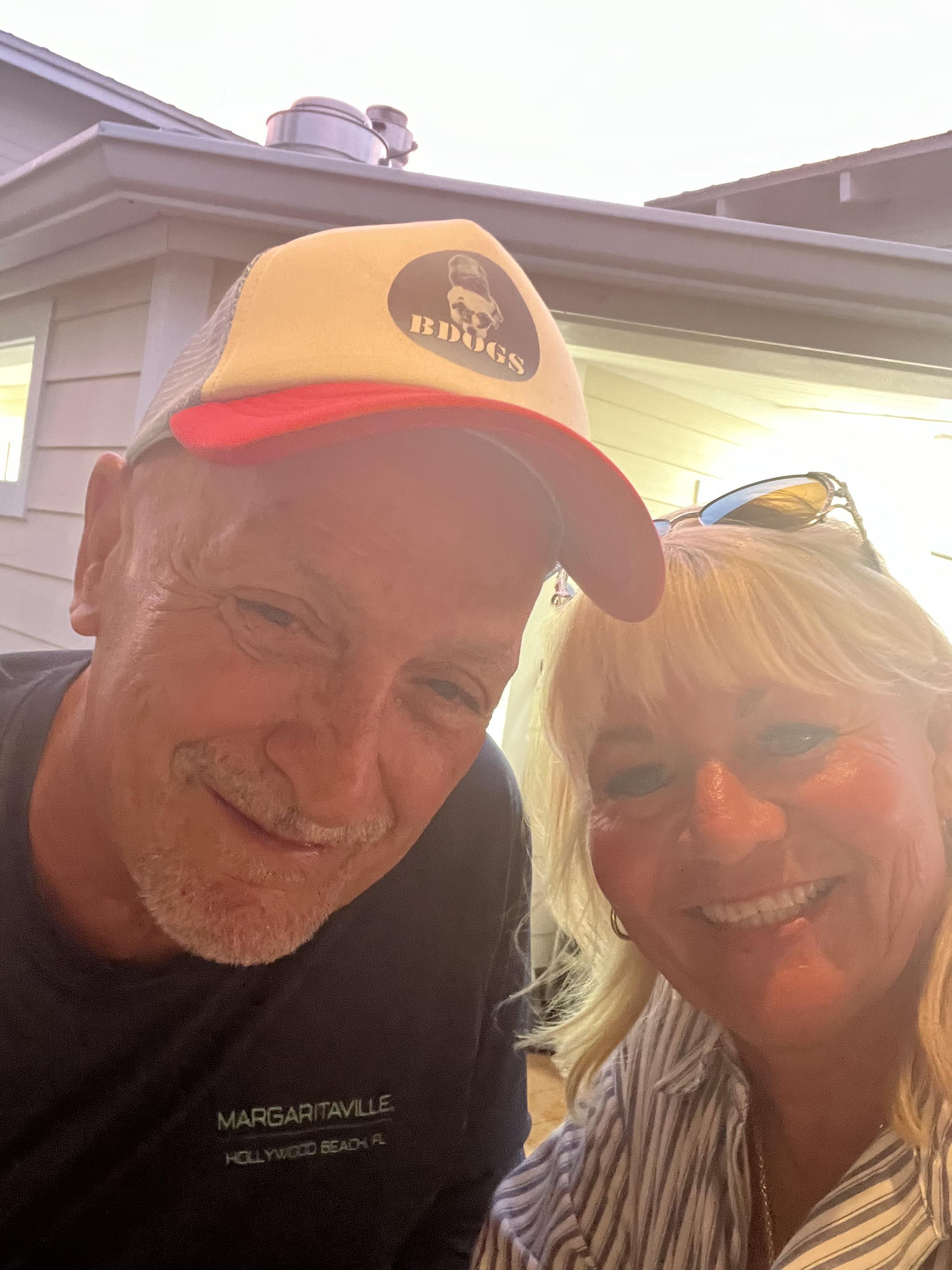 A man and woman smiling for a picture
