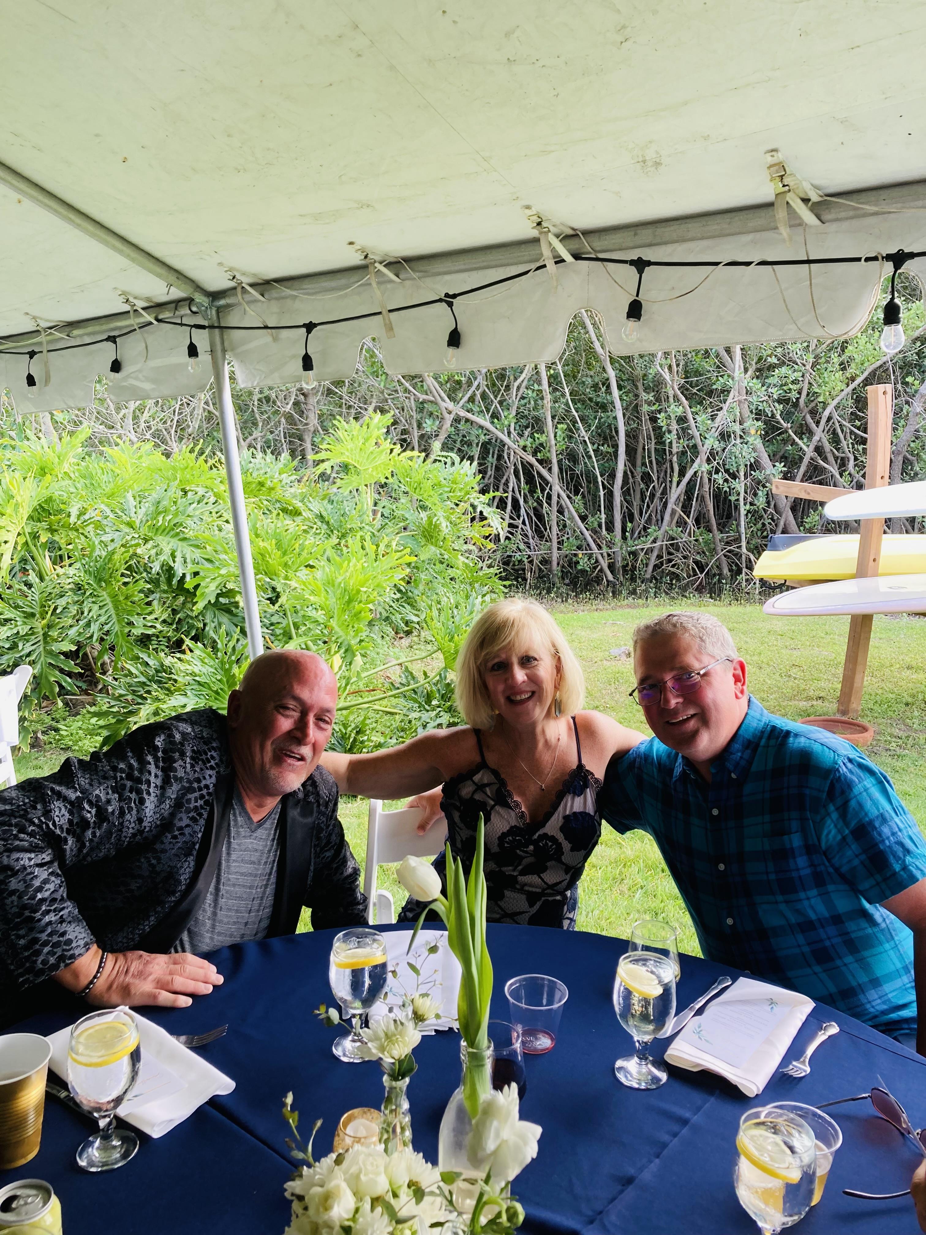 A group of people sitting at a table