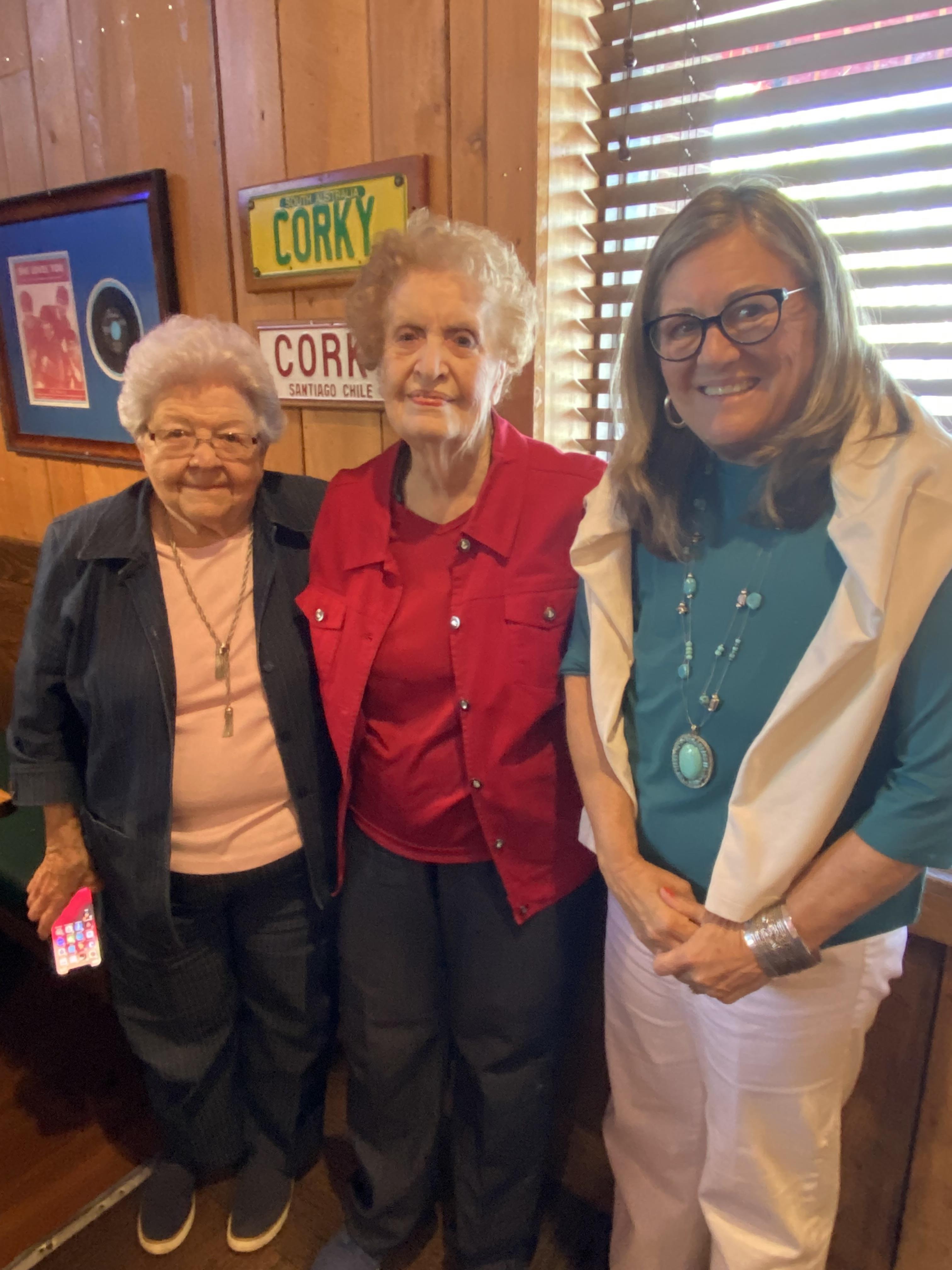 A group of women posing for a photo
