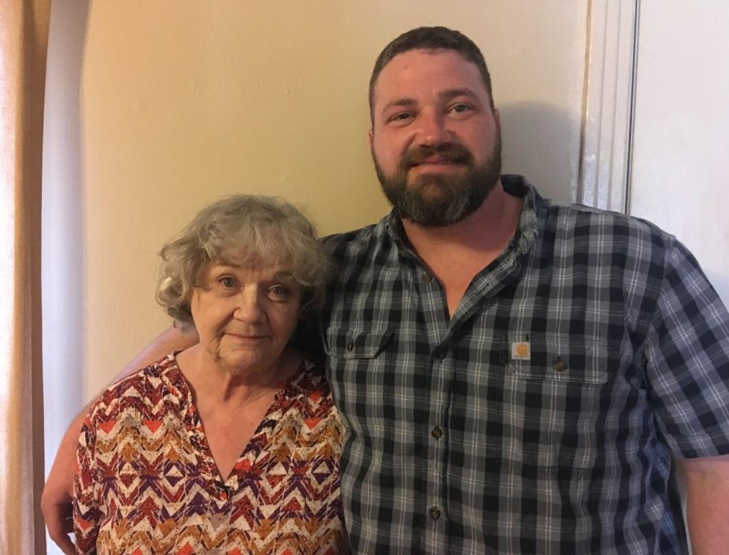 A man and woman posing for a picture