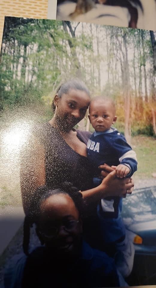 A woman holding a baby