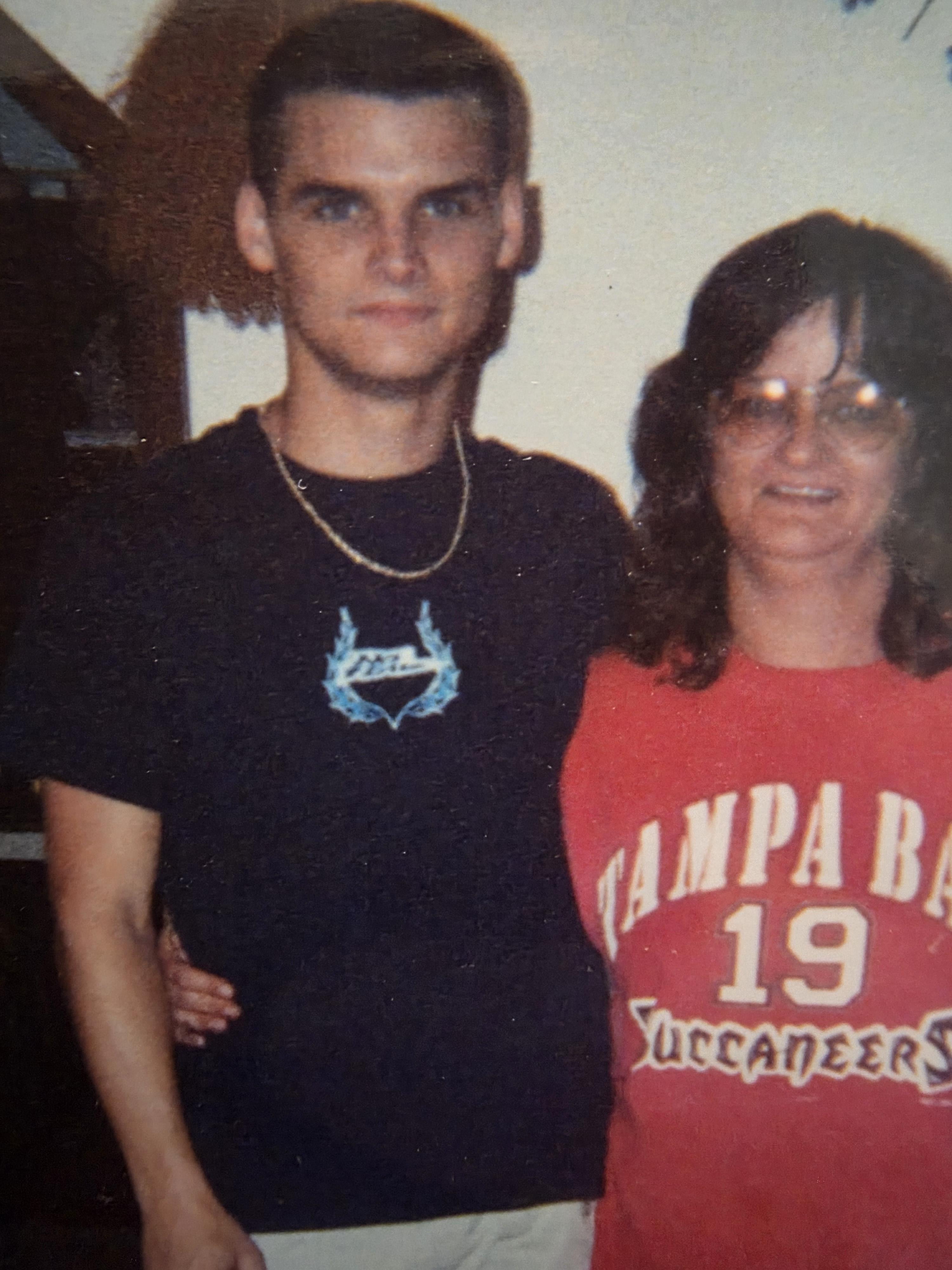 A man and woman posing for a picture