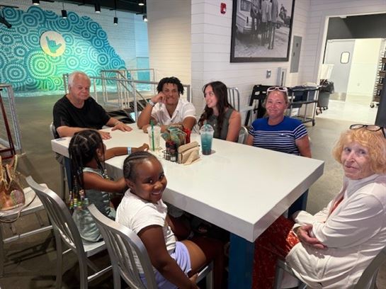 A group of people sitting at a table