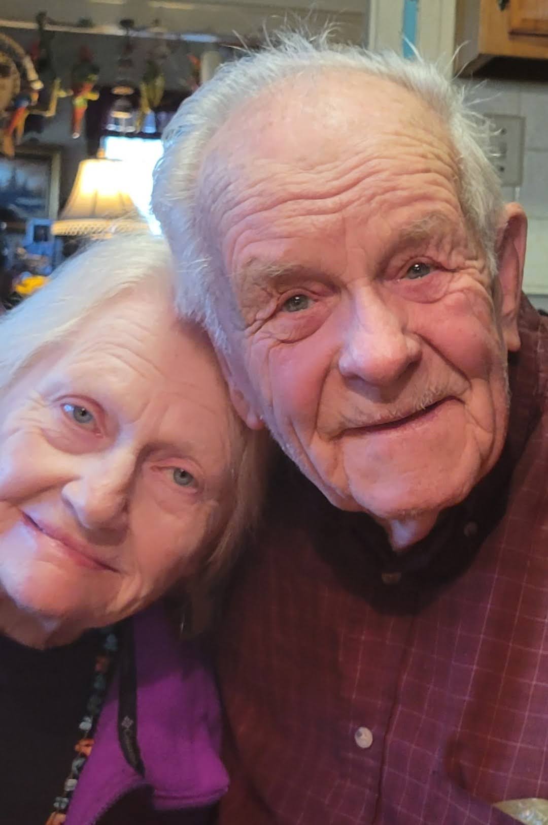 A man and woman smiling for the camera
