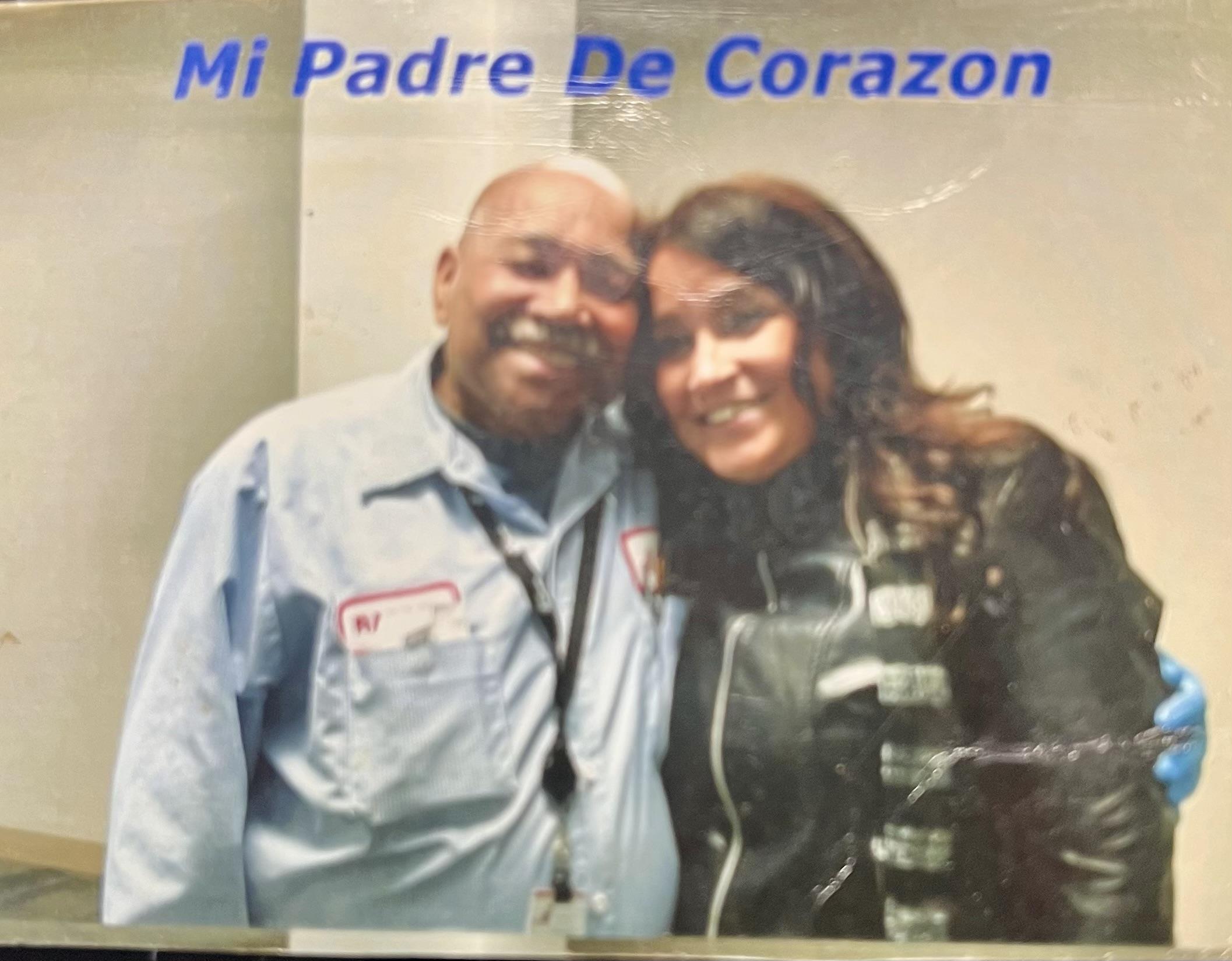 A man and woman posing for a picture