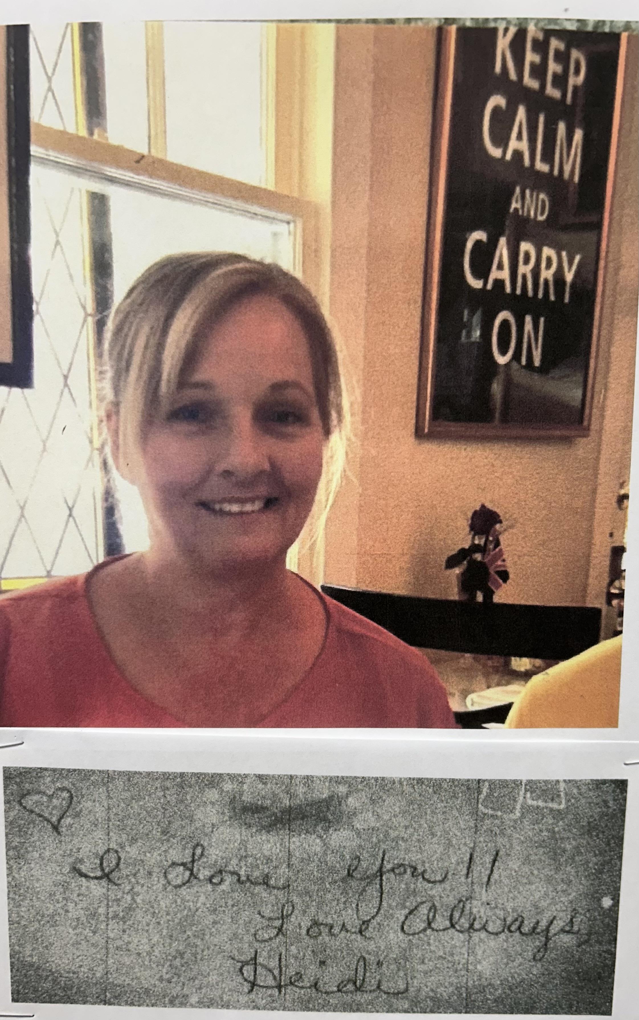 A woman smiling at camera
