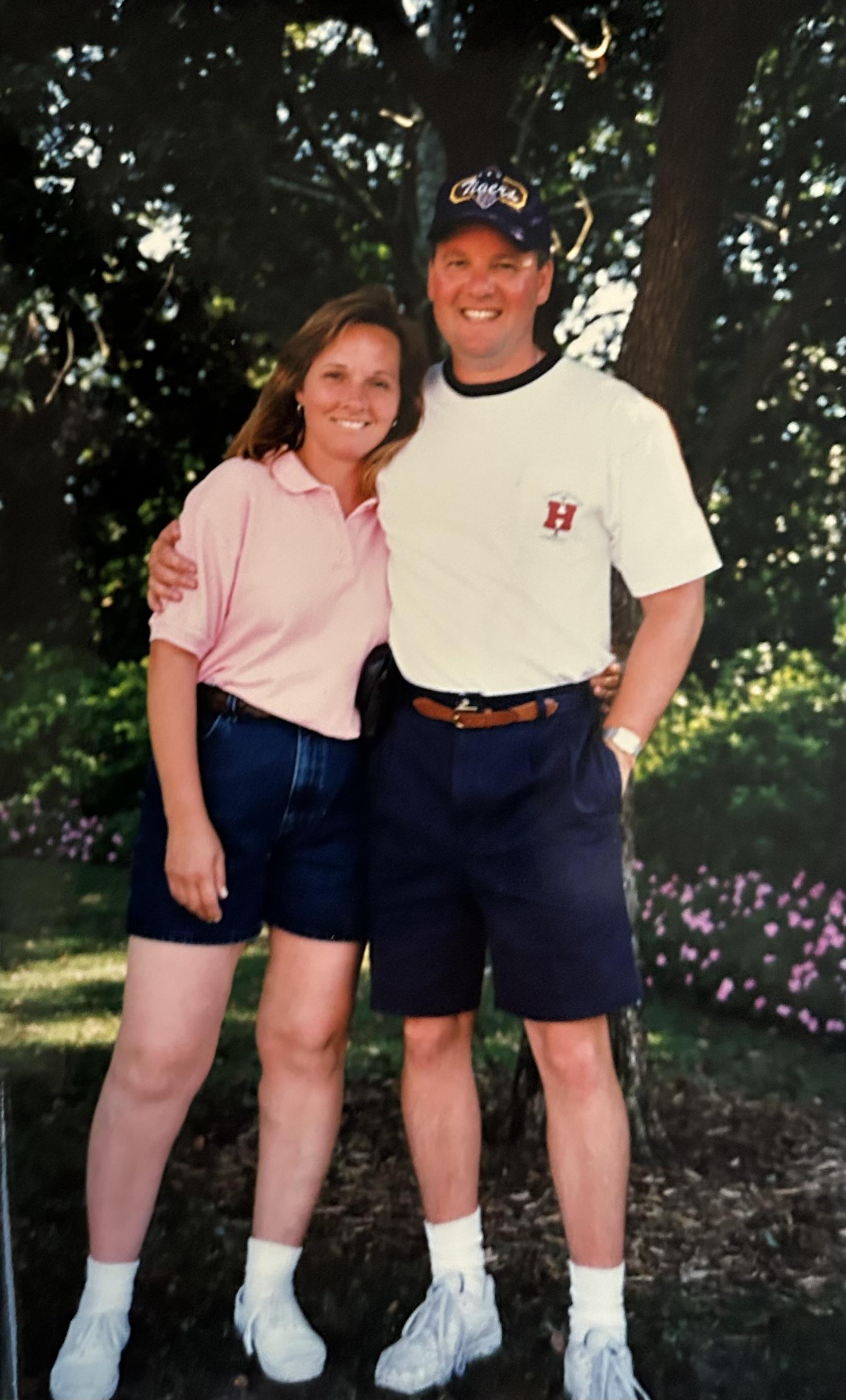 A man and woman posing for a picture