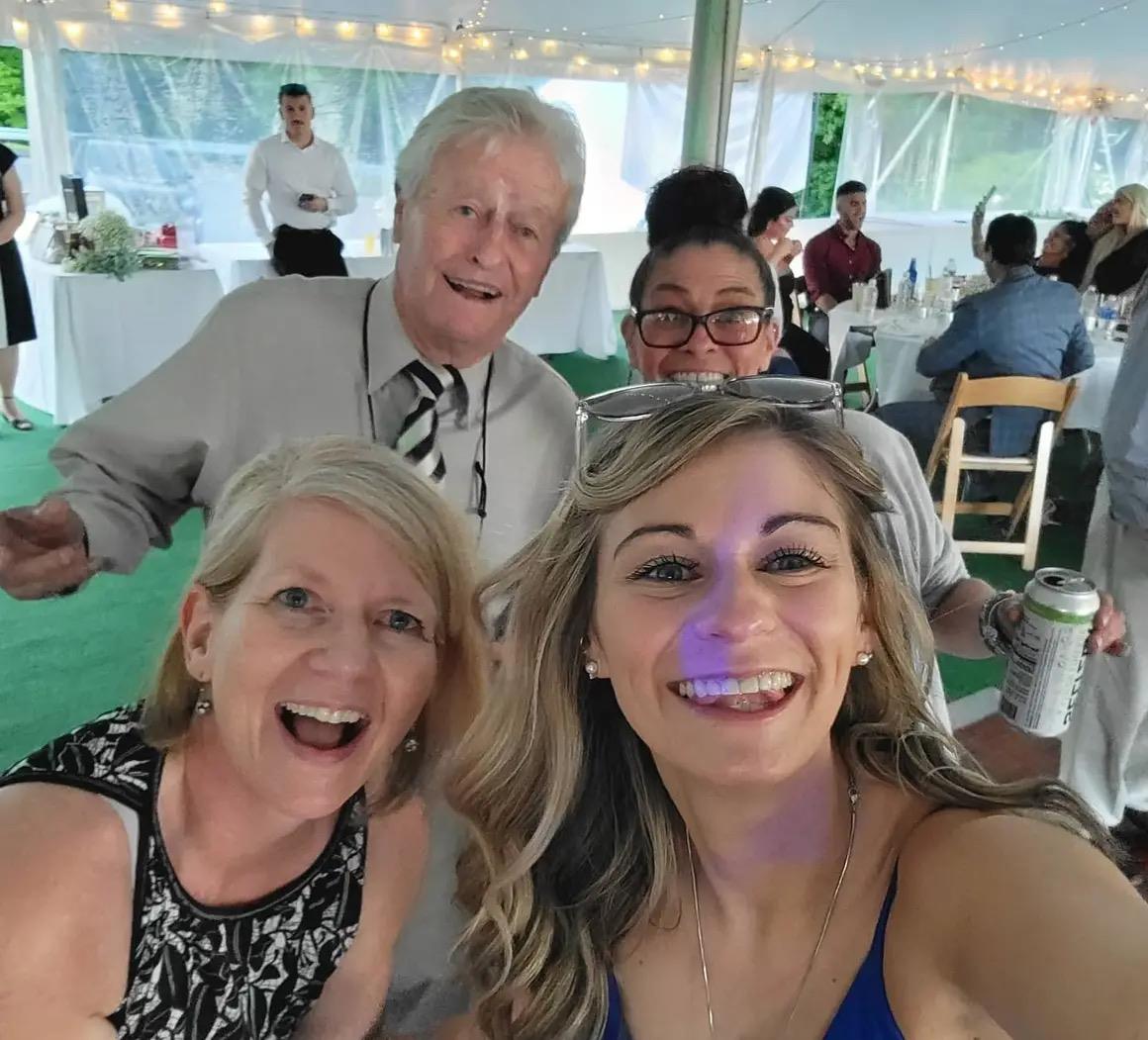 A group of people taking a selfie