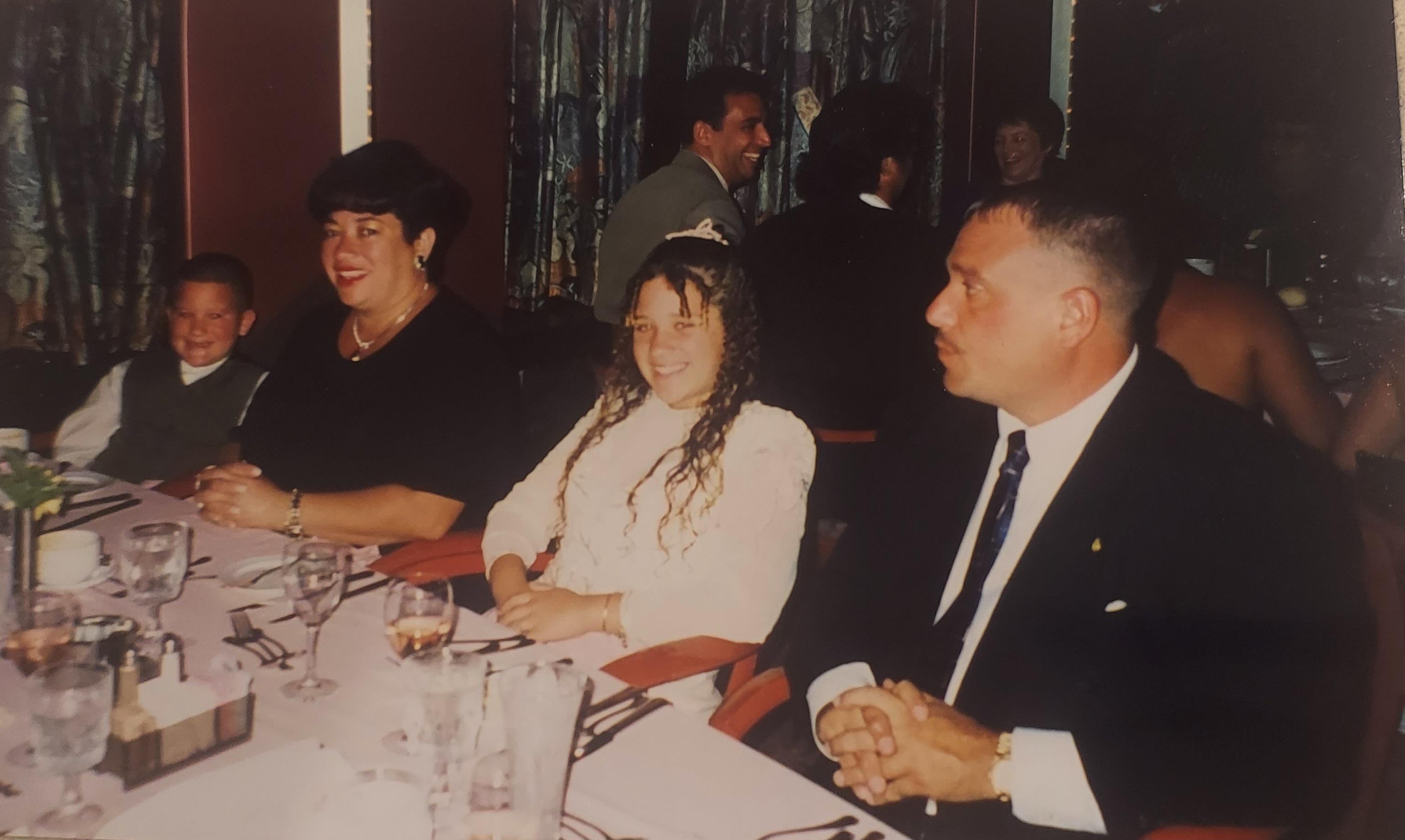 A group of people sitting at a table
