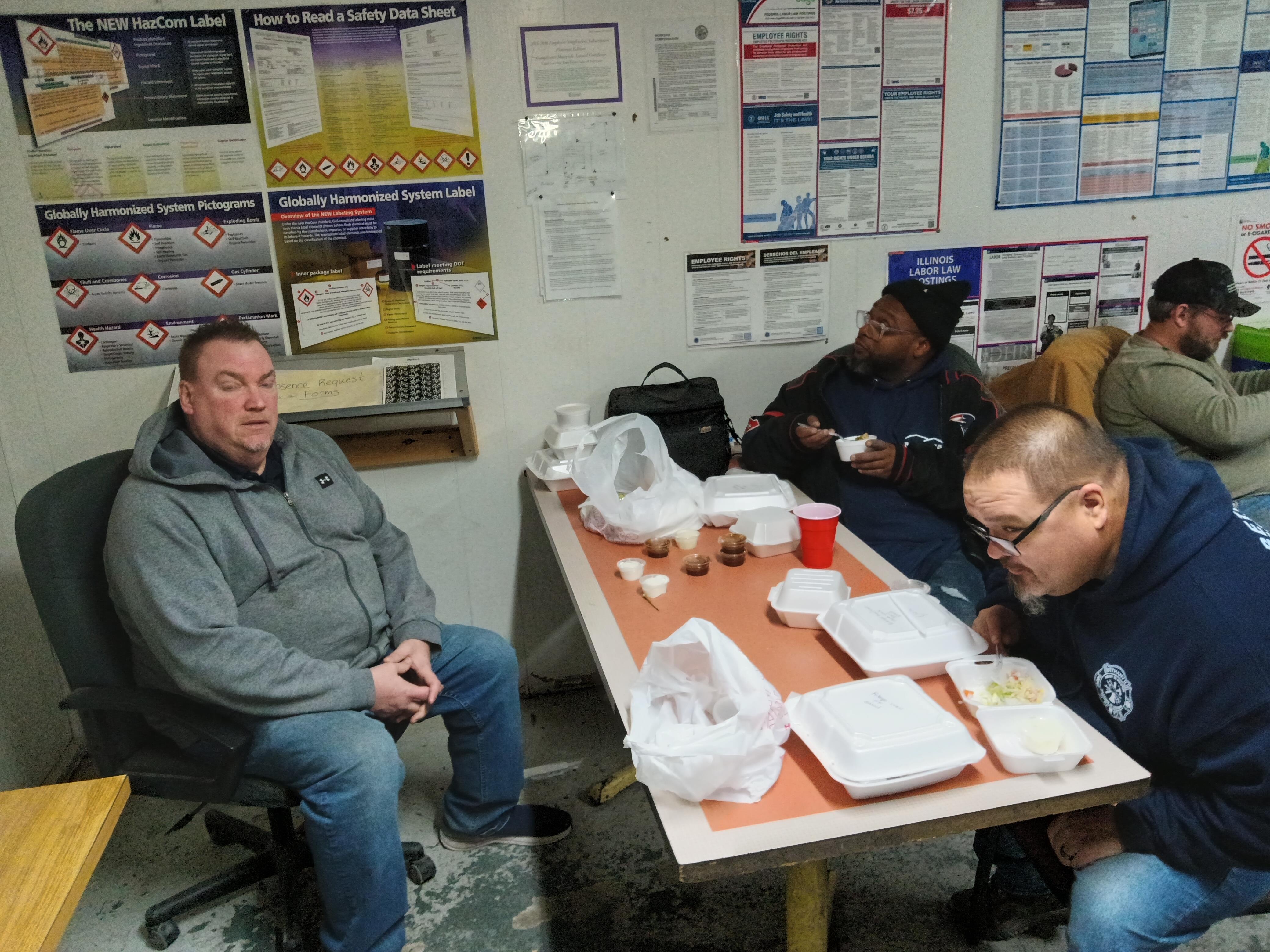 A group of people sitting at a table