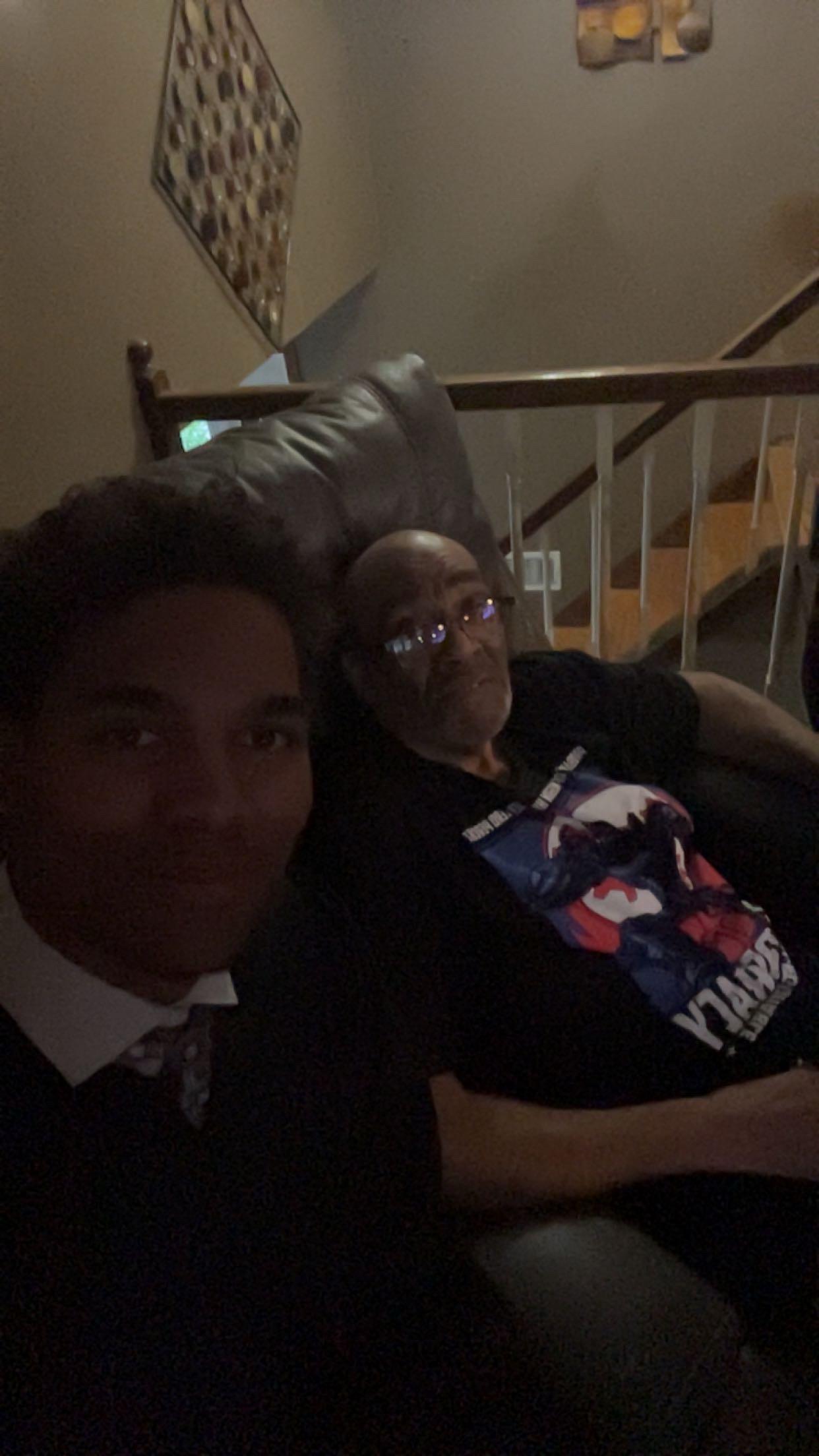 Two men sitting on a couch