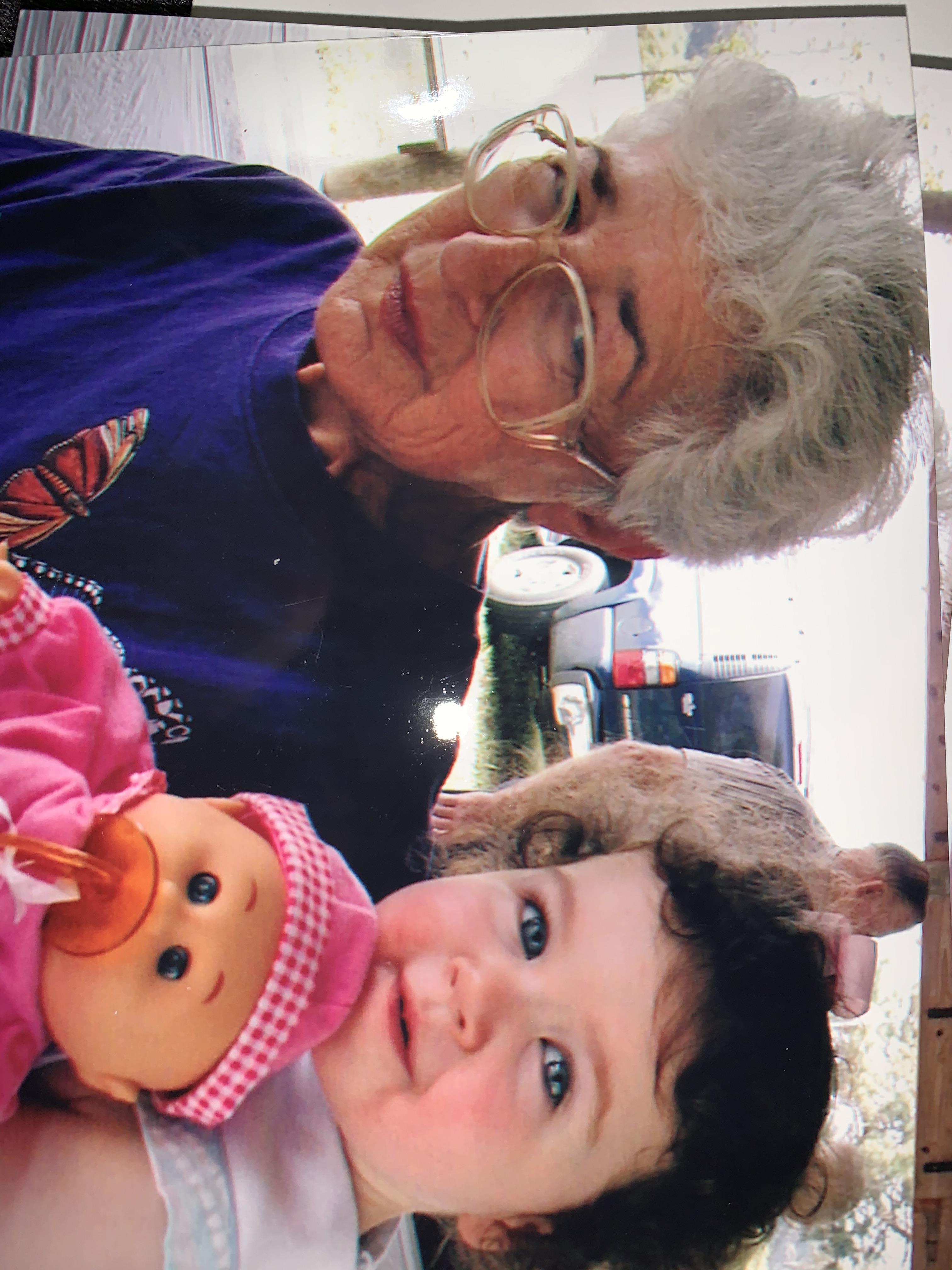 A woman and a child posing for a picture