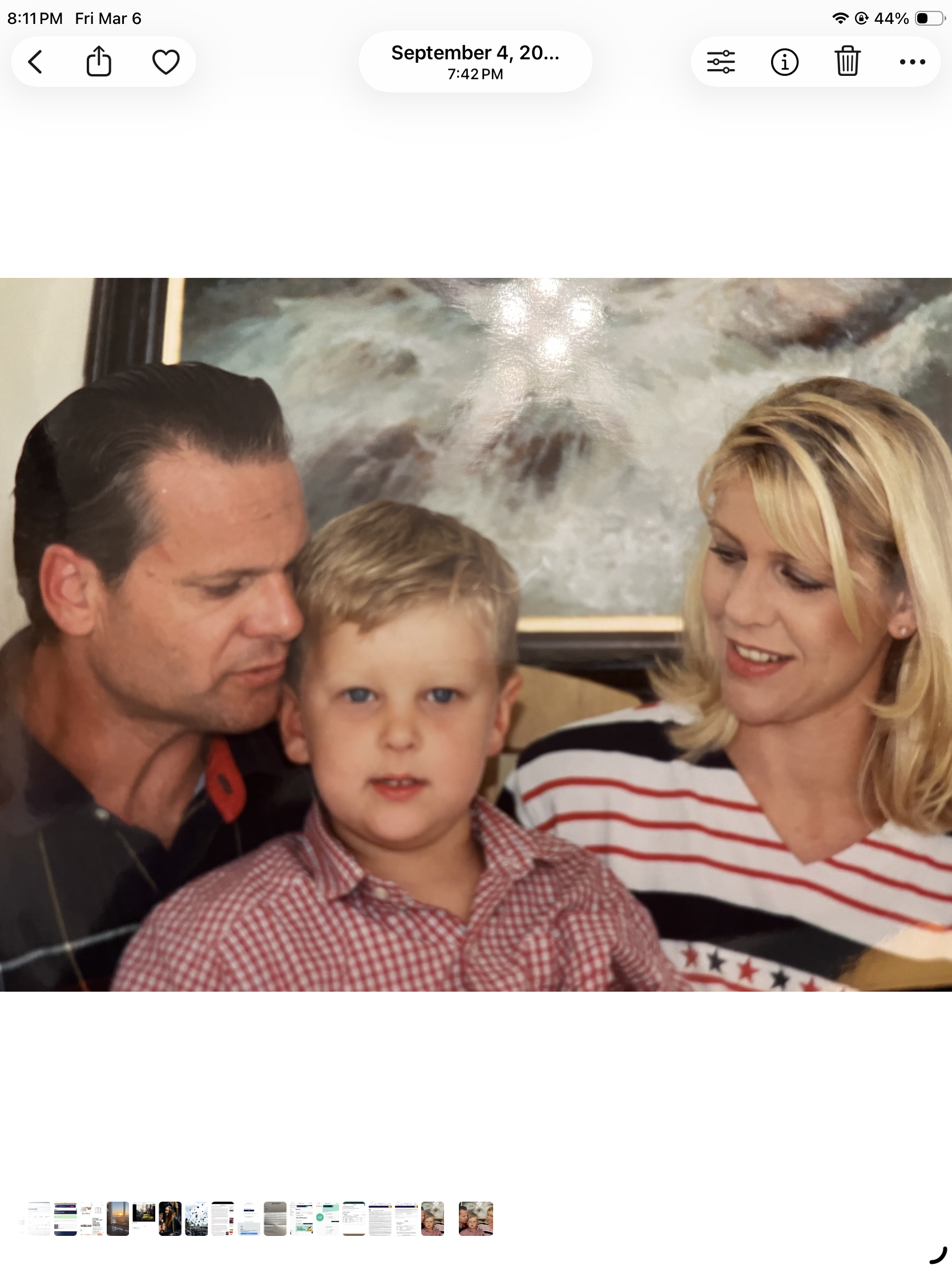 A man and woman with a child