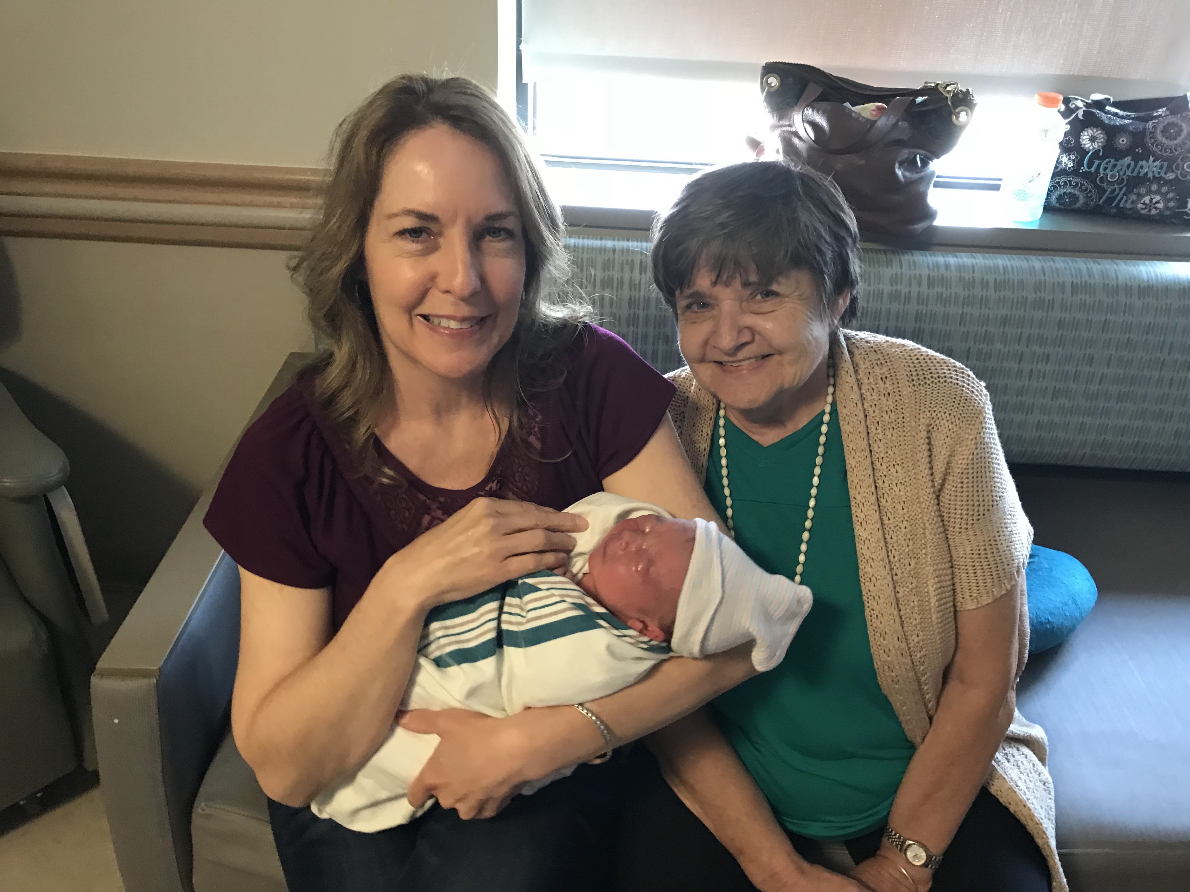 A woman holding a baby