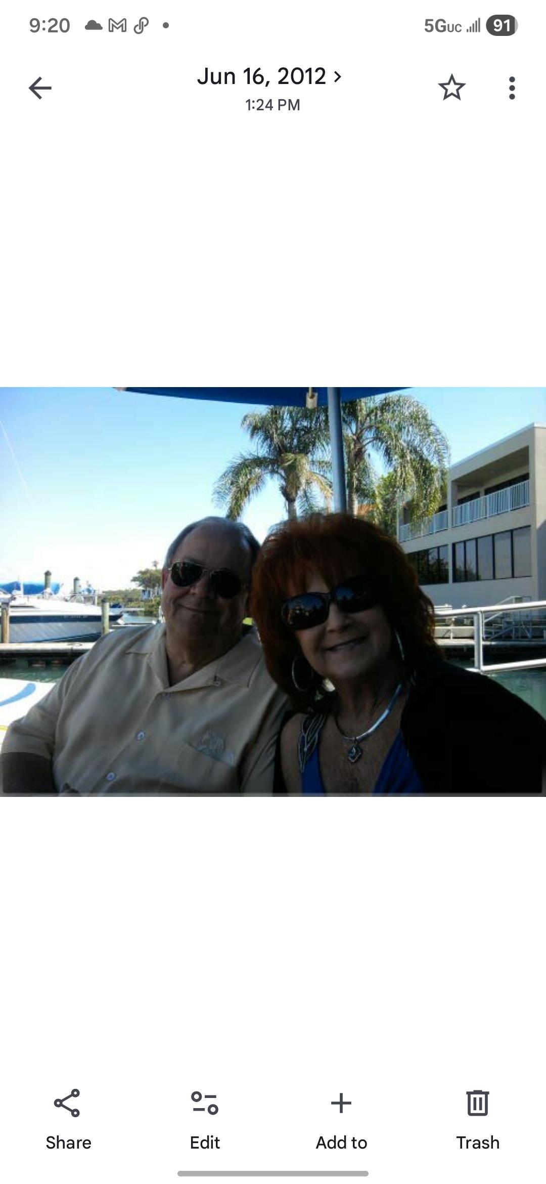 A man and woman posing for a picture