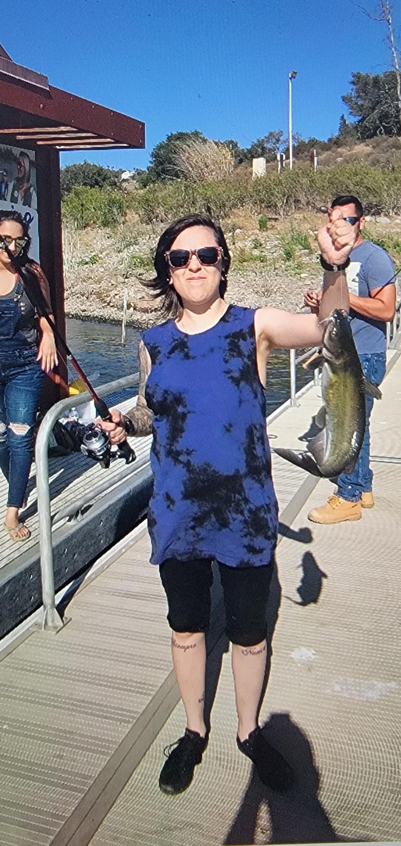 A woman holding a fish