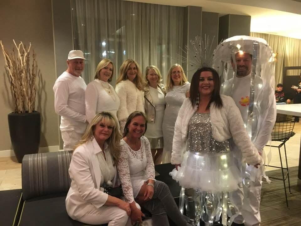 A group of people posing for a photo