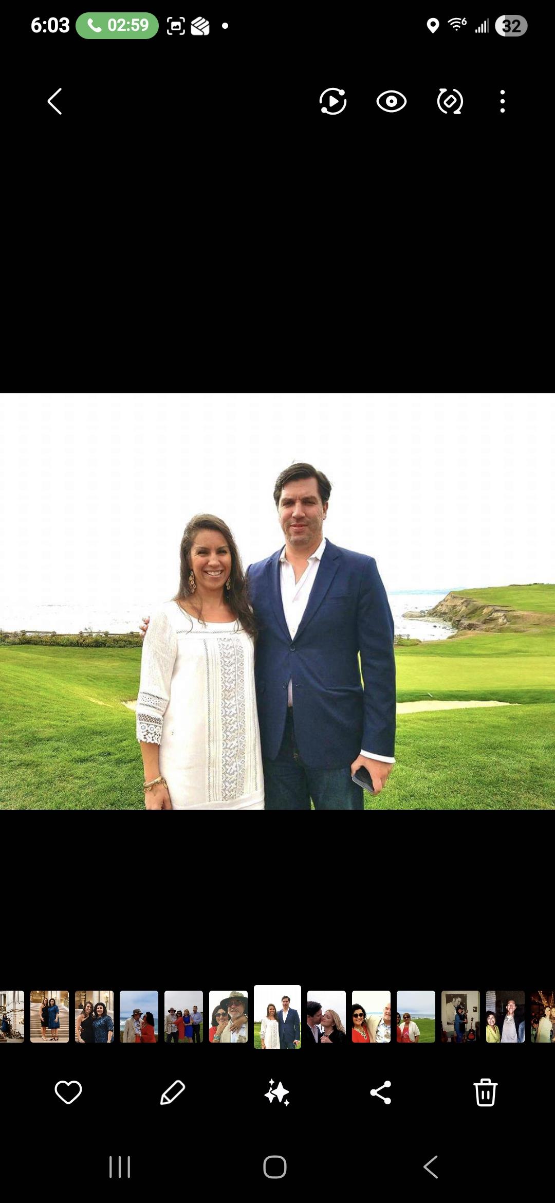 A man and woman standing in a field
