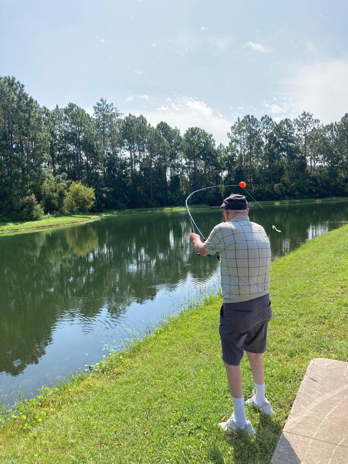 A man fishing in a lake