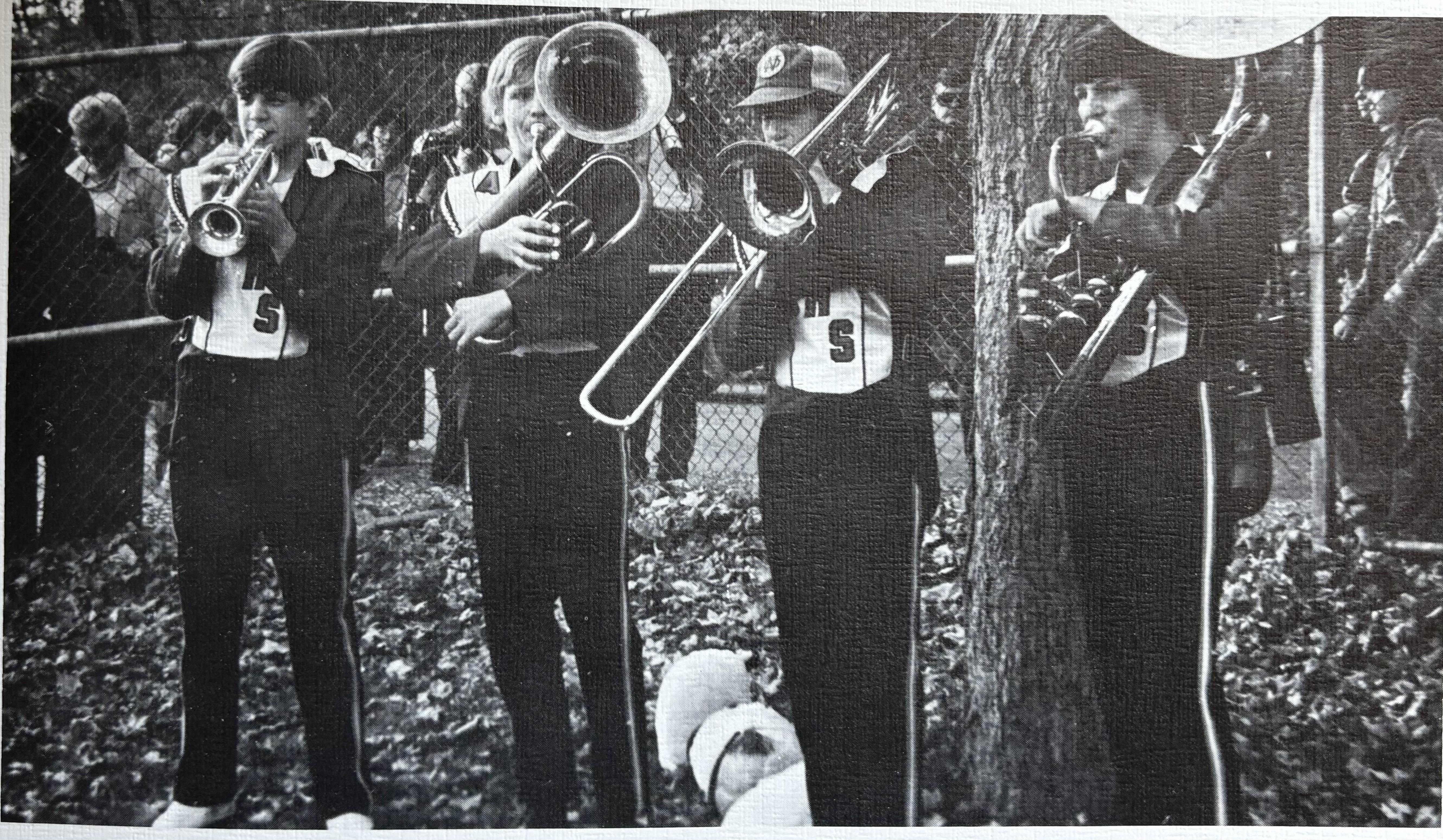 A group of people playing instruments