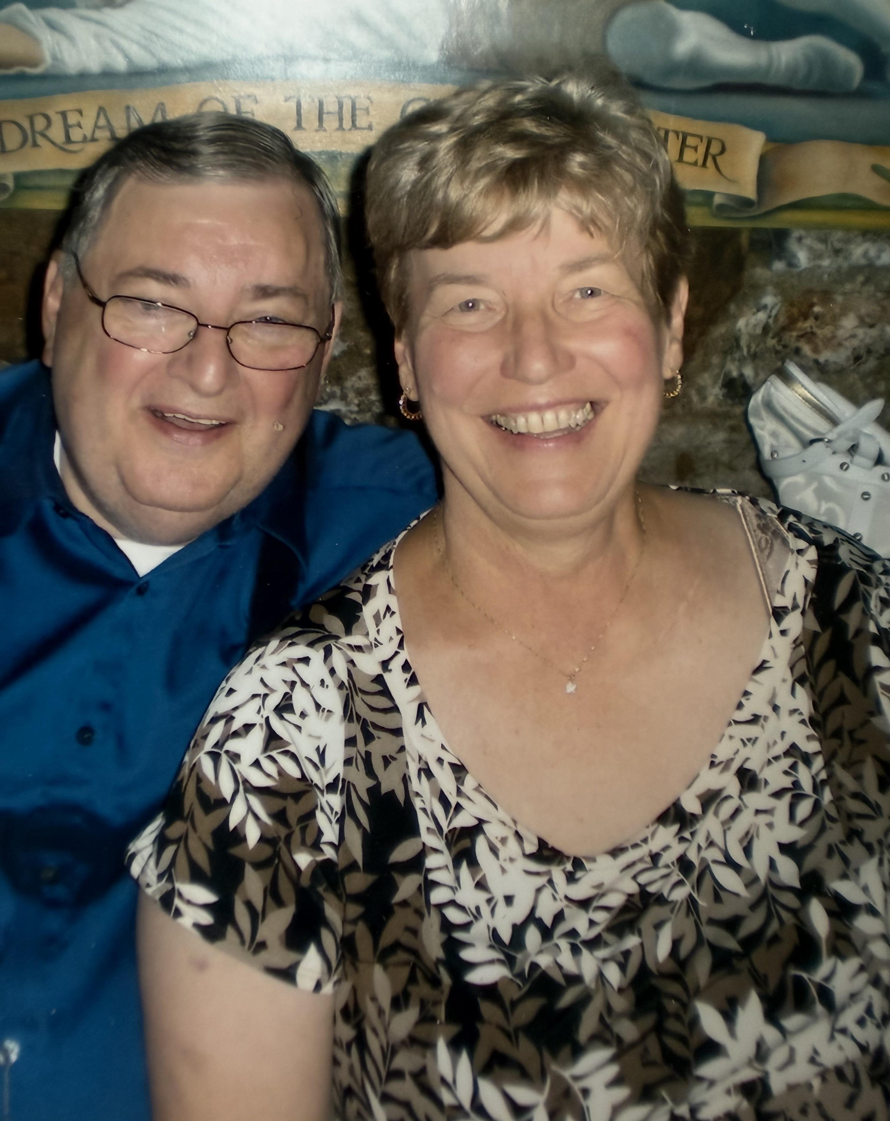 A man and woman smiling for a picture