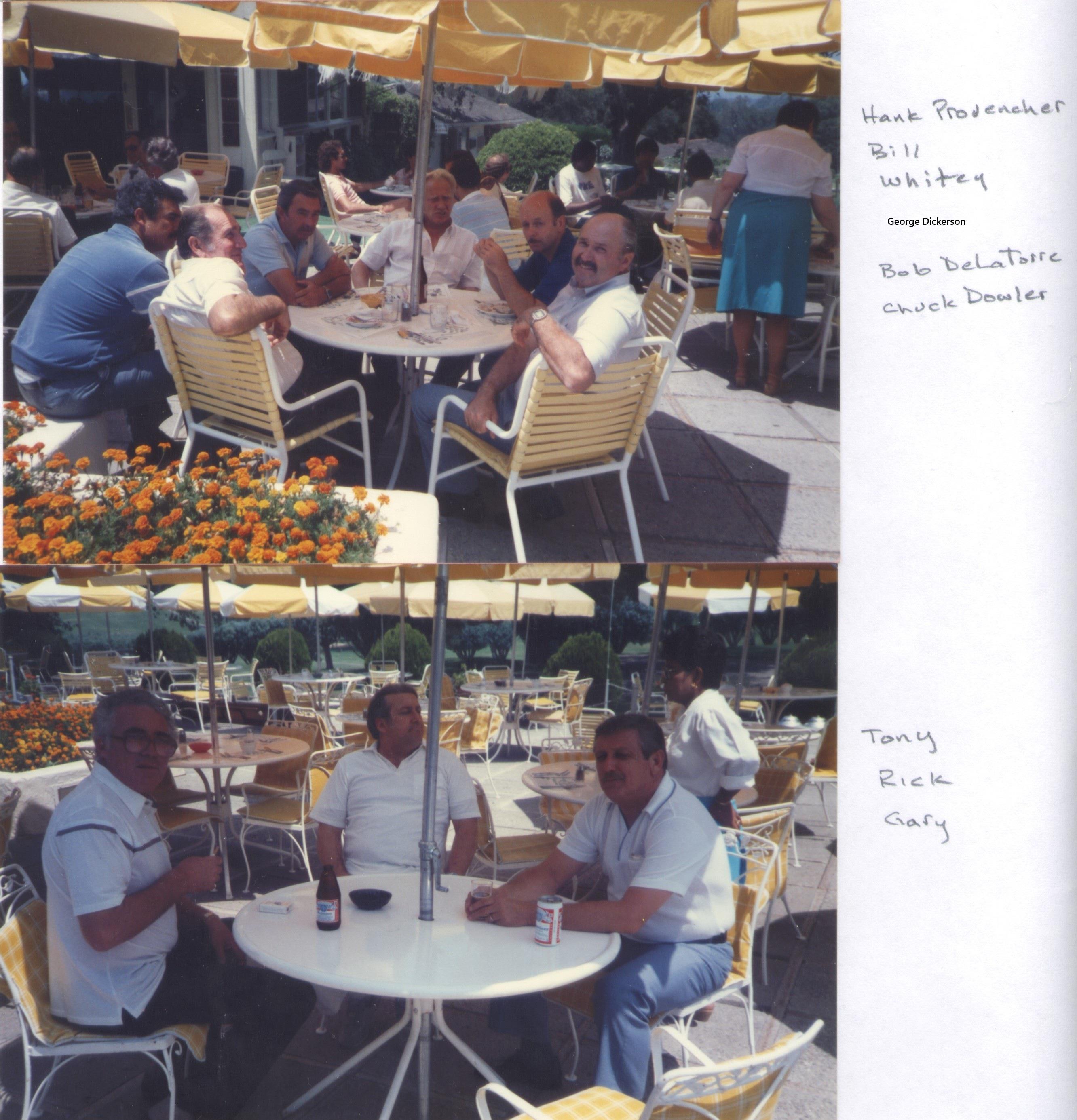 A group of men sitting at a table