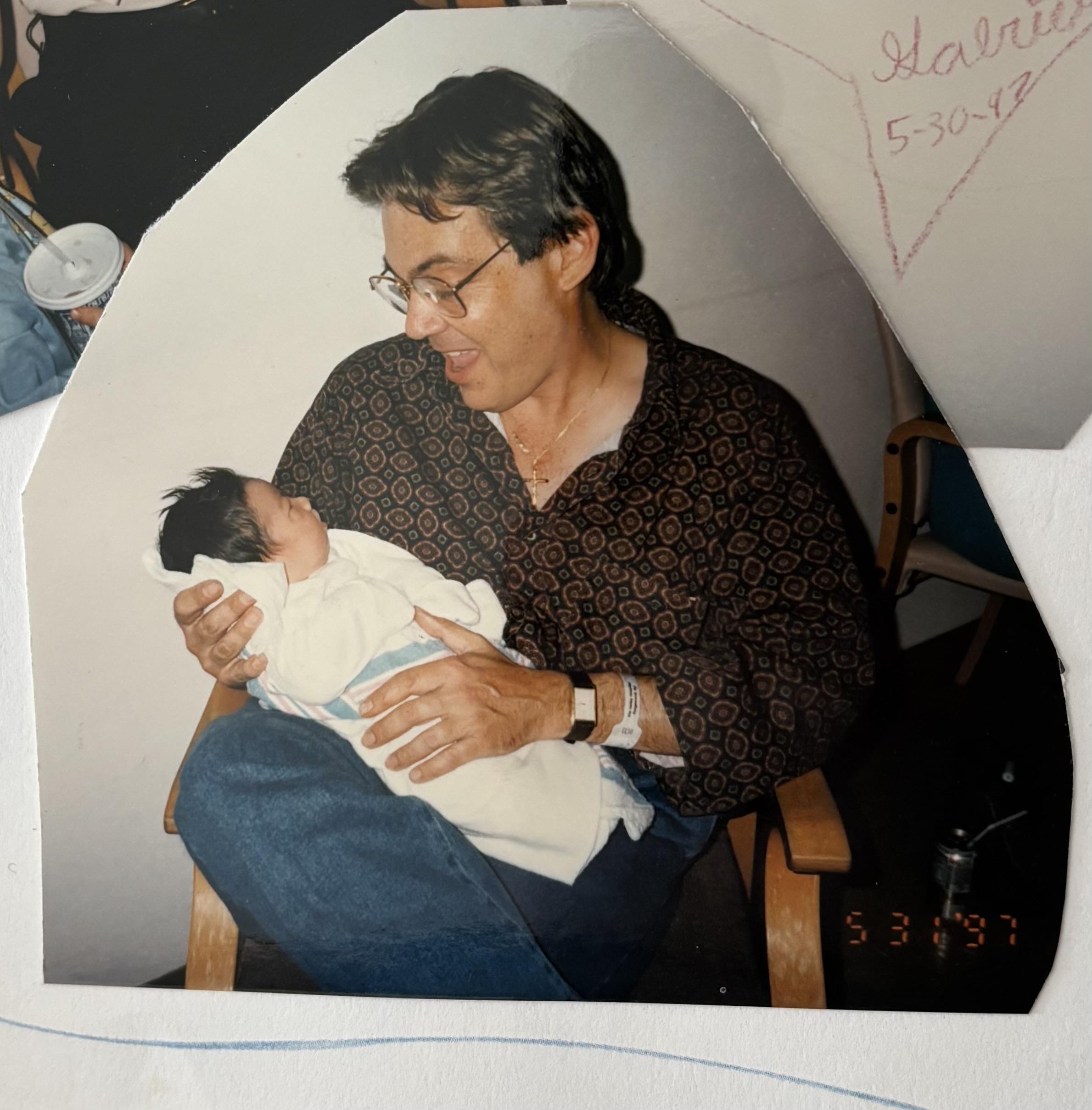 A man holding a baby