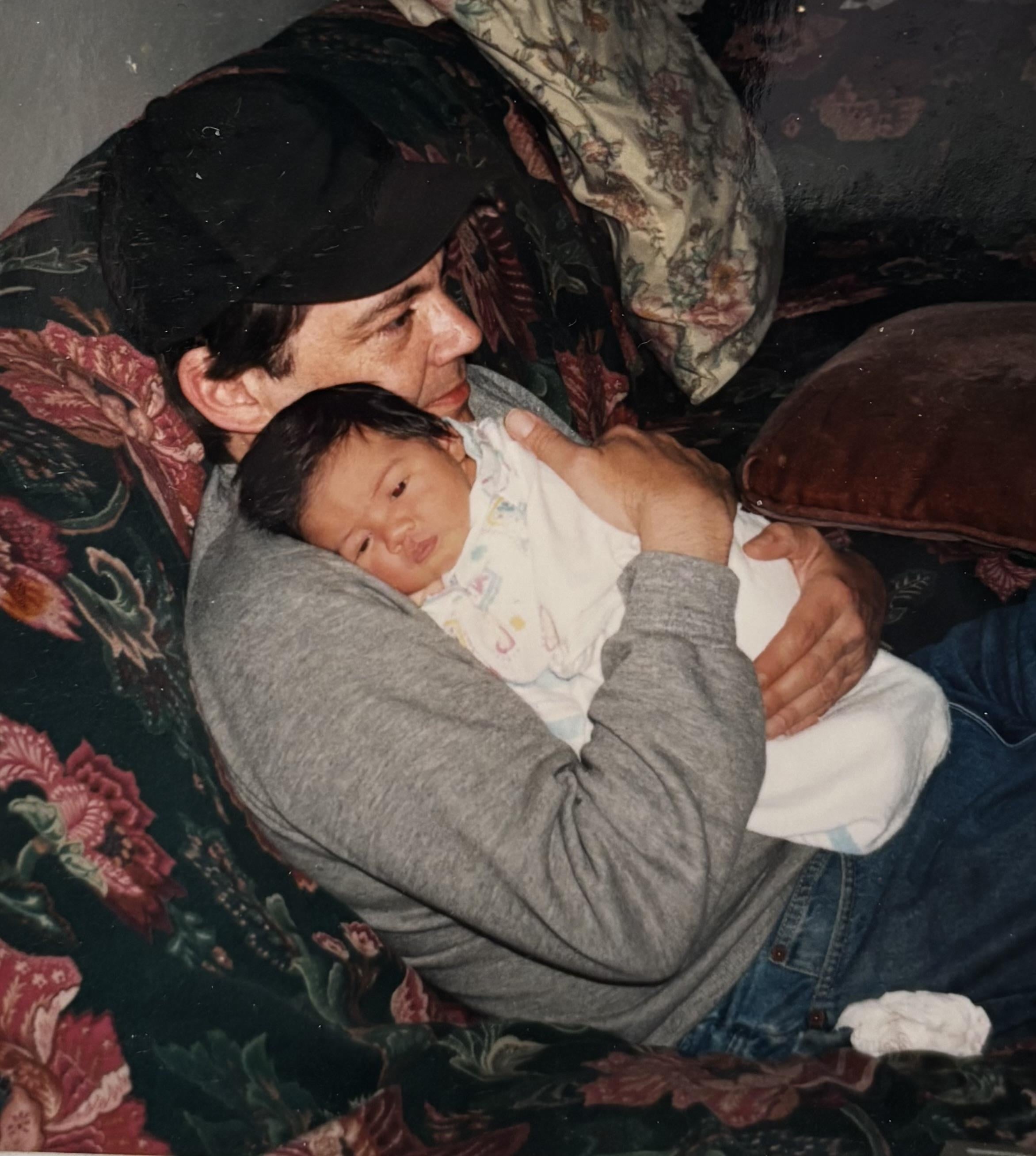 A man holding a baby
