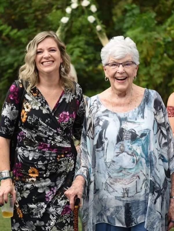 Two women smiling at the camera