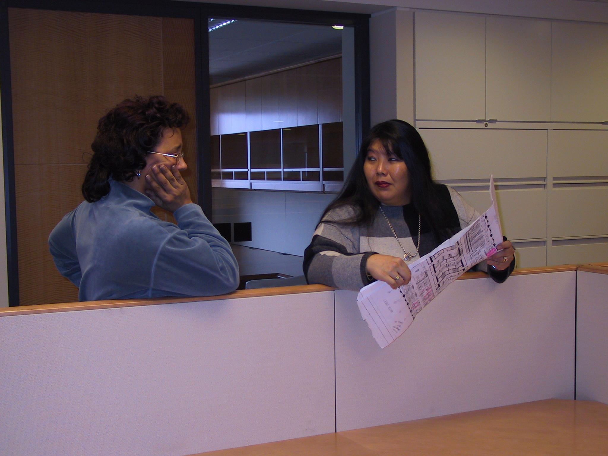 A woman talking to another woman