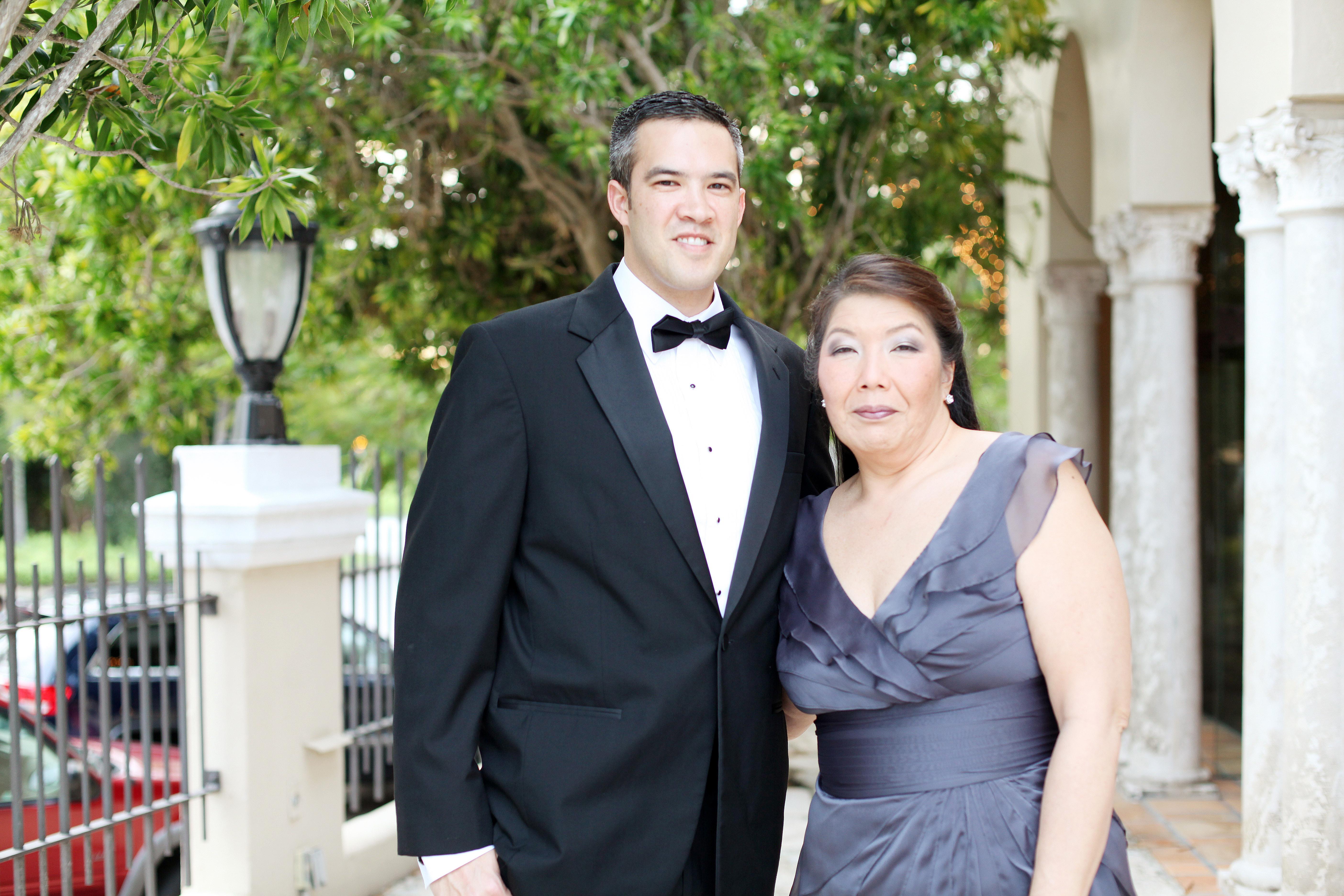 A man and woman posing for a picture