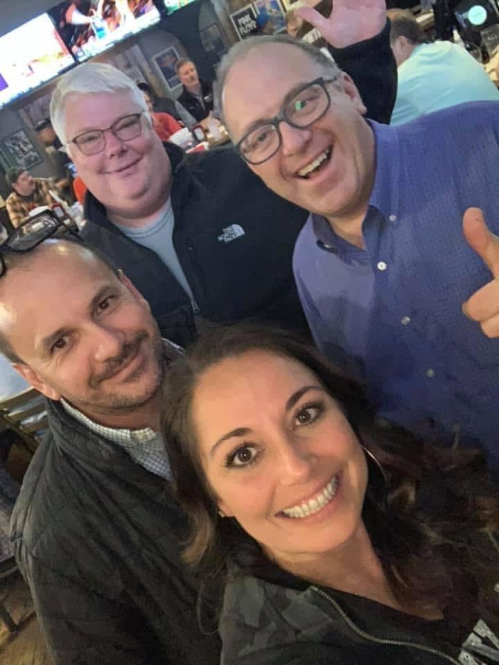 A group of people posing for a photo