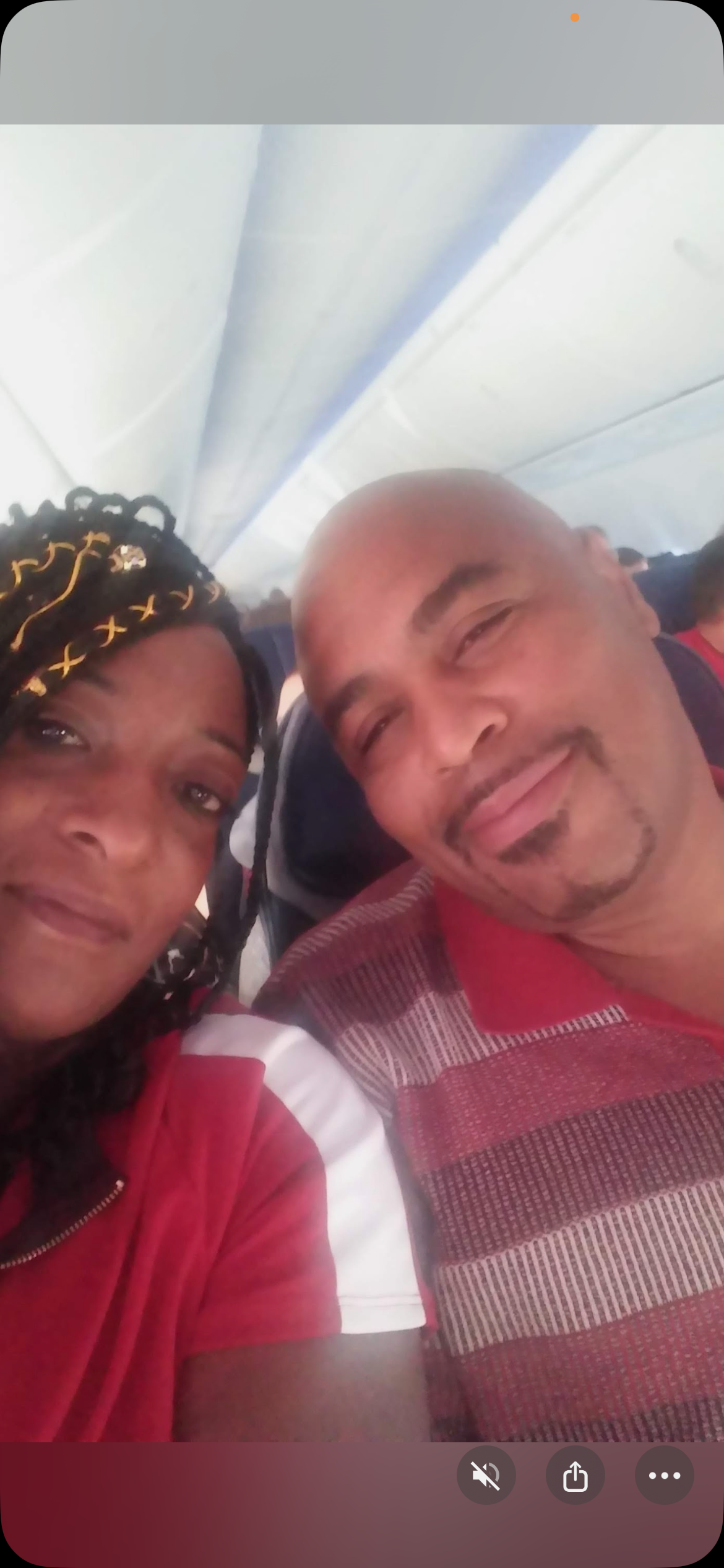 A man and woman taking a selfie