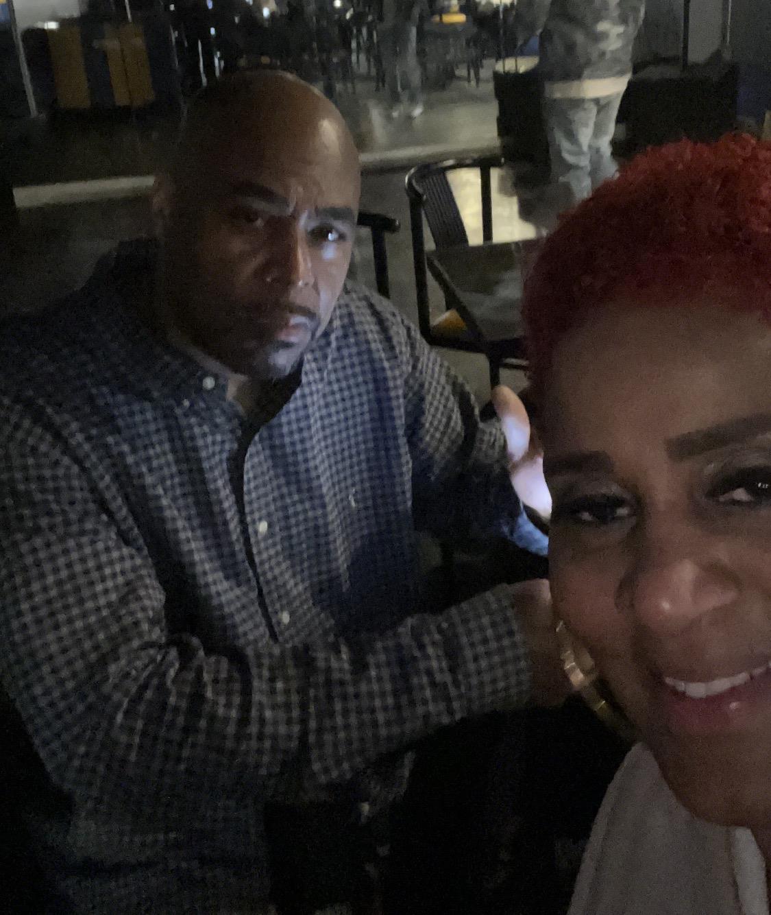 A man and woman taking a selfie