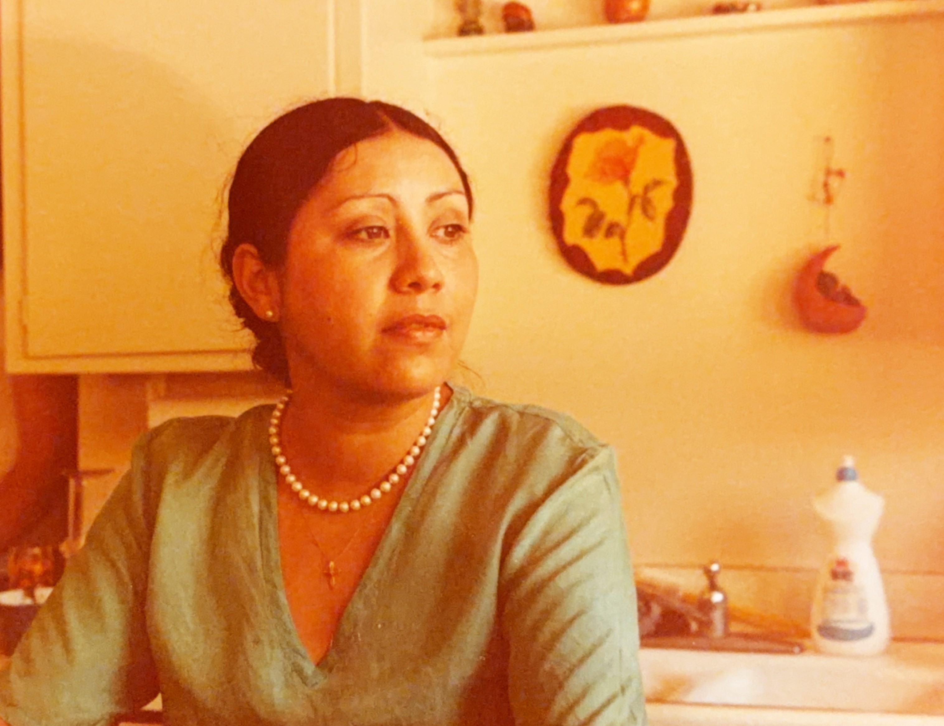 A woman in a green shirt