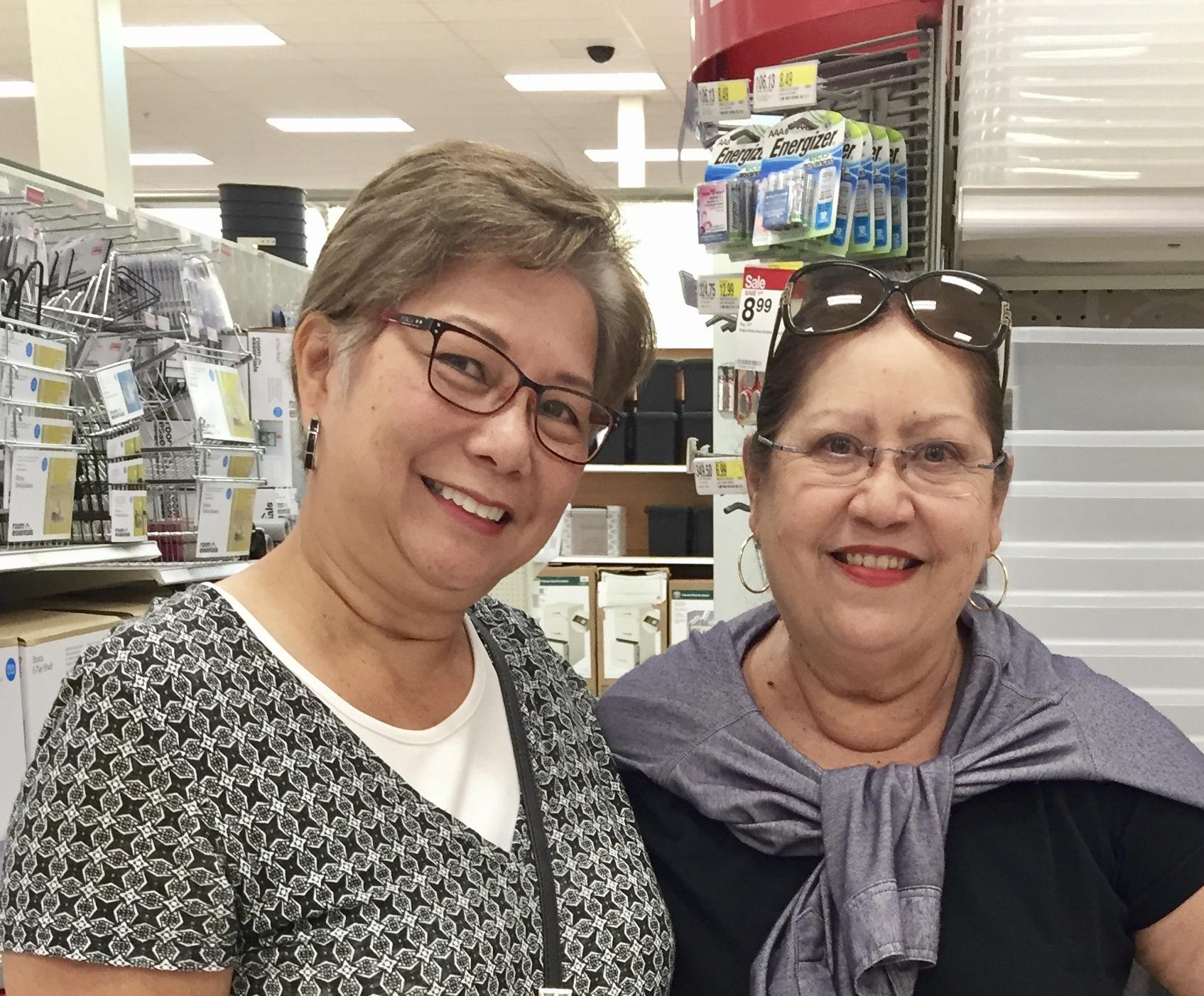 Two women smiling at the camera