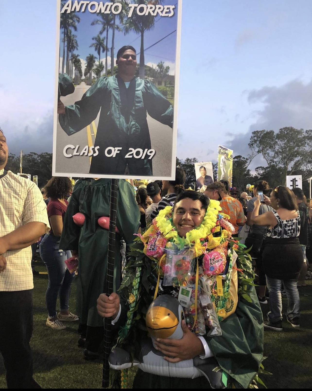 A man holding a sign