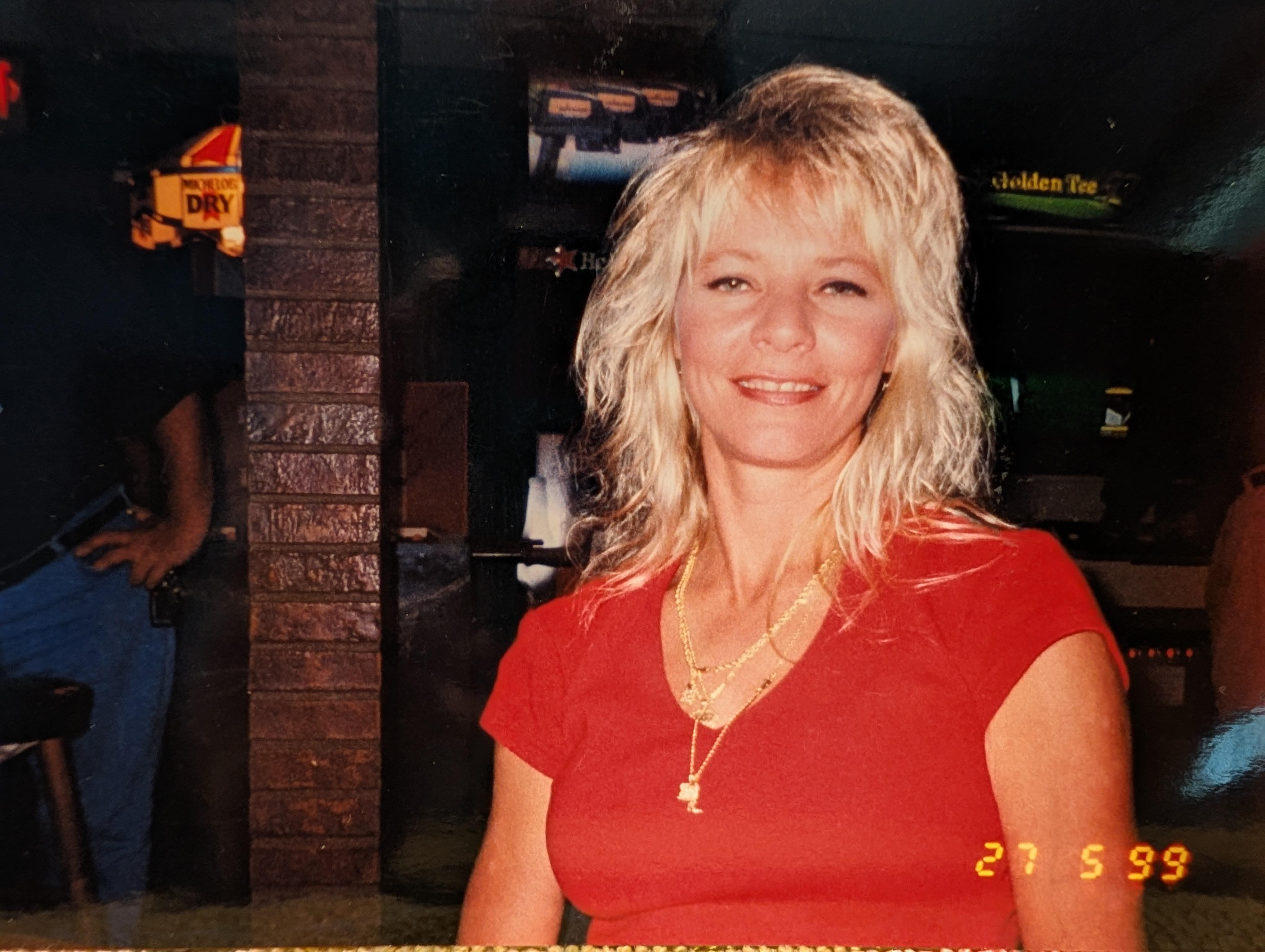 A woman smiling at the camera