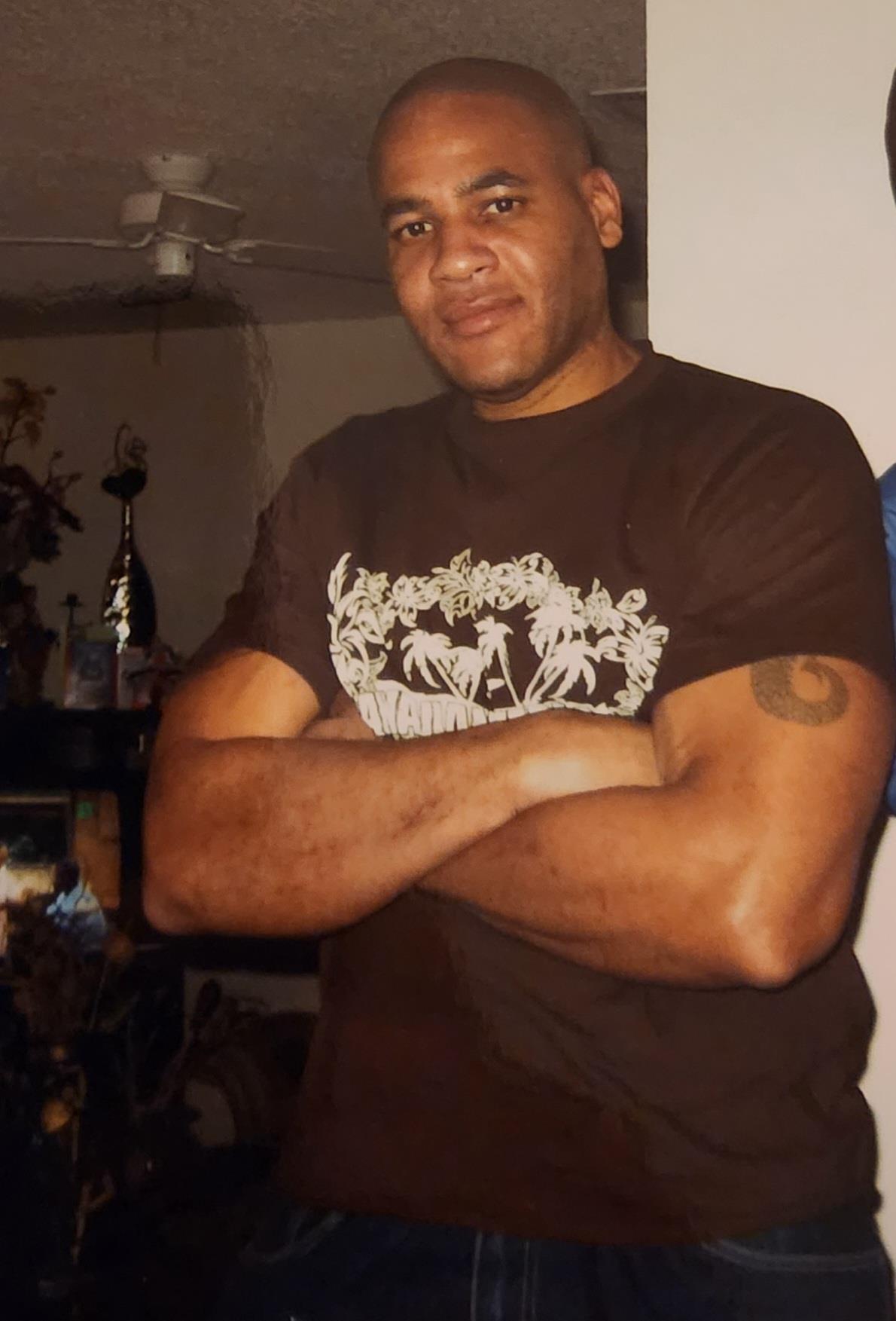 A man with arms crossed