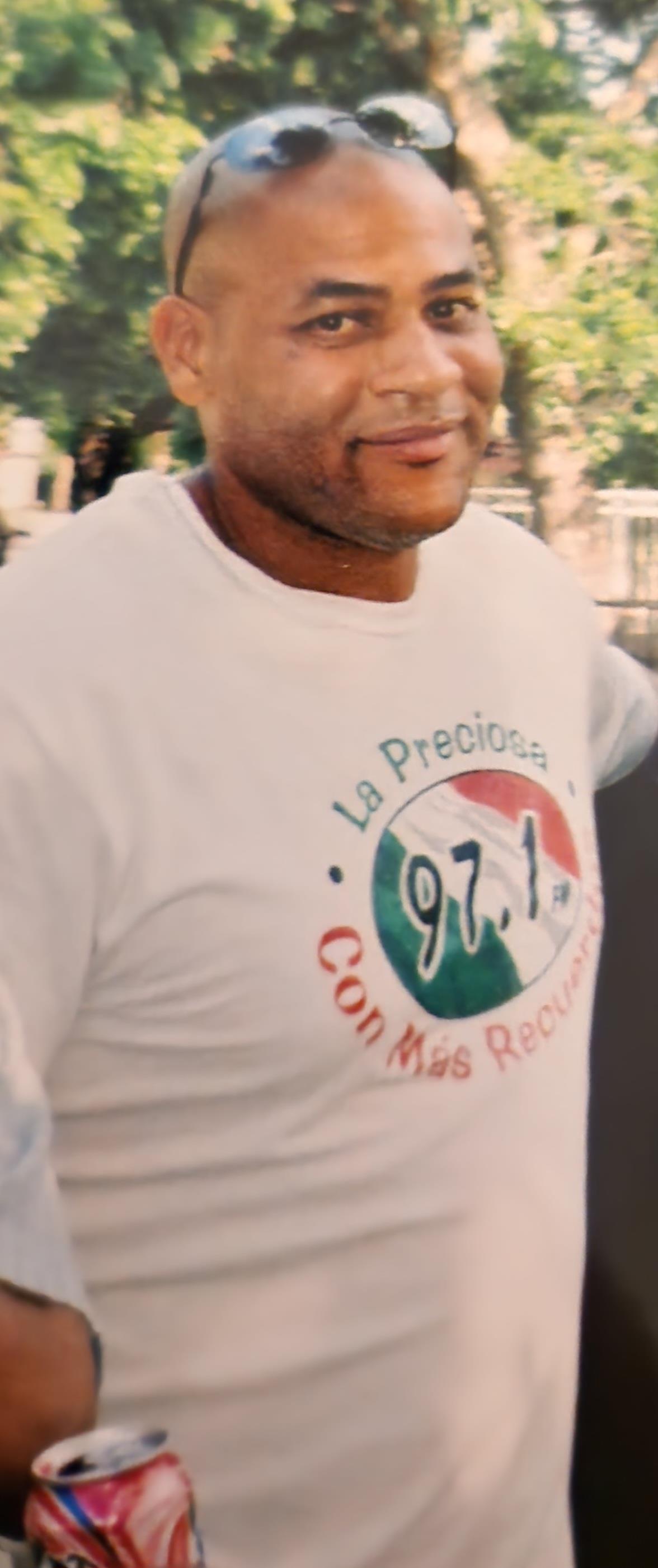 A man wearing a white shirt