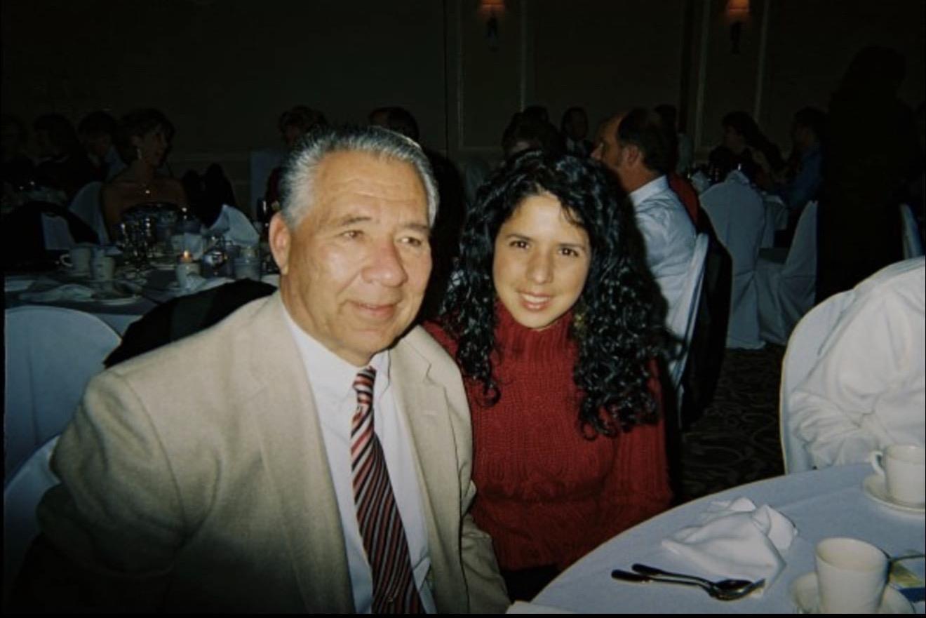 A man and woman sitting at a table