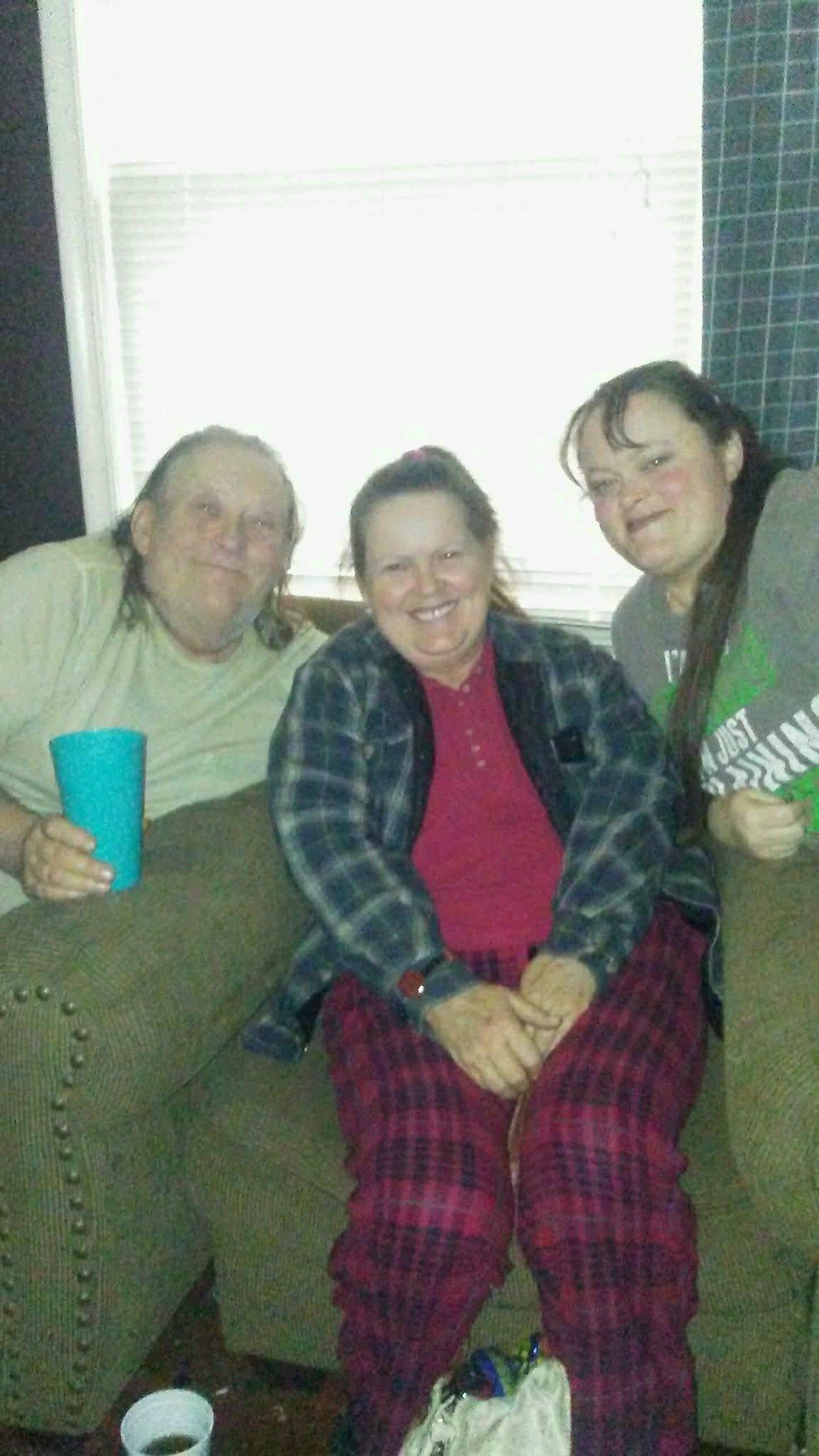 A group of people sitting on a couch