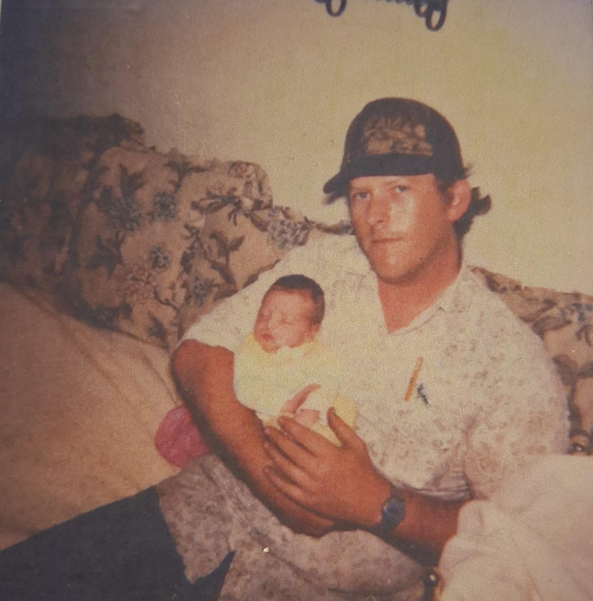 A man holding a baby