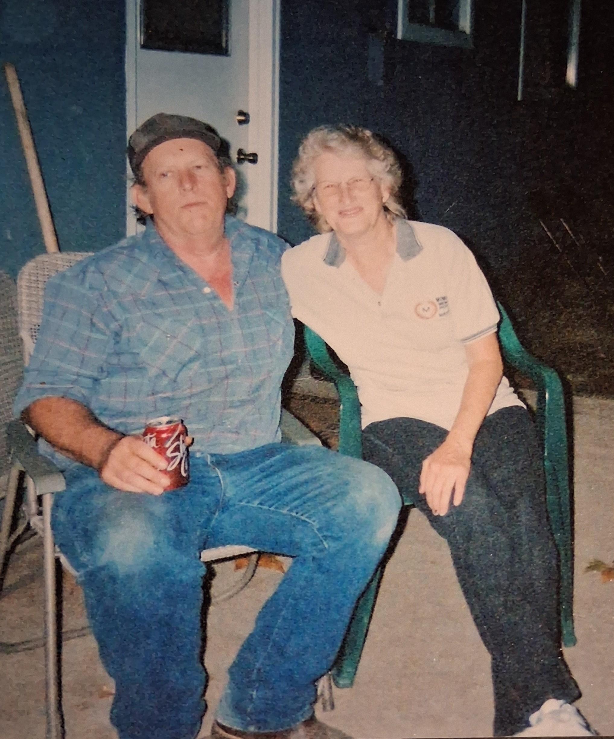 A man and woman sitting in chairs