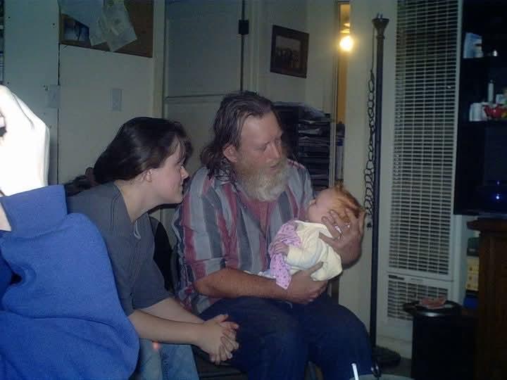 A man holding a baby