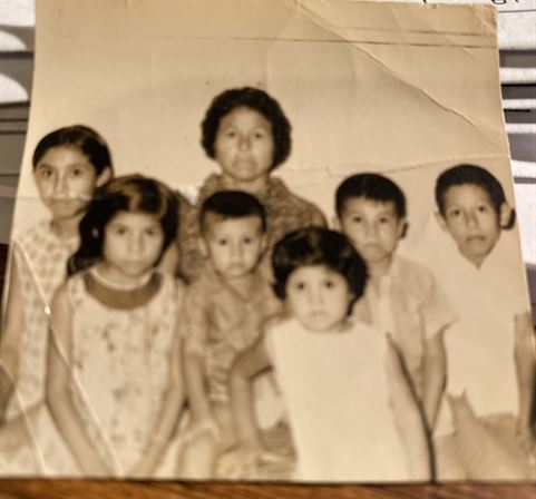 A group of children posing for a photo