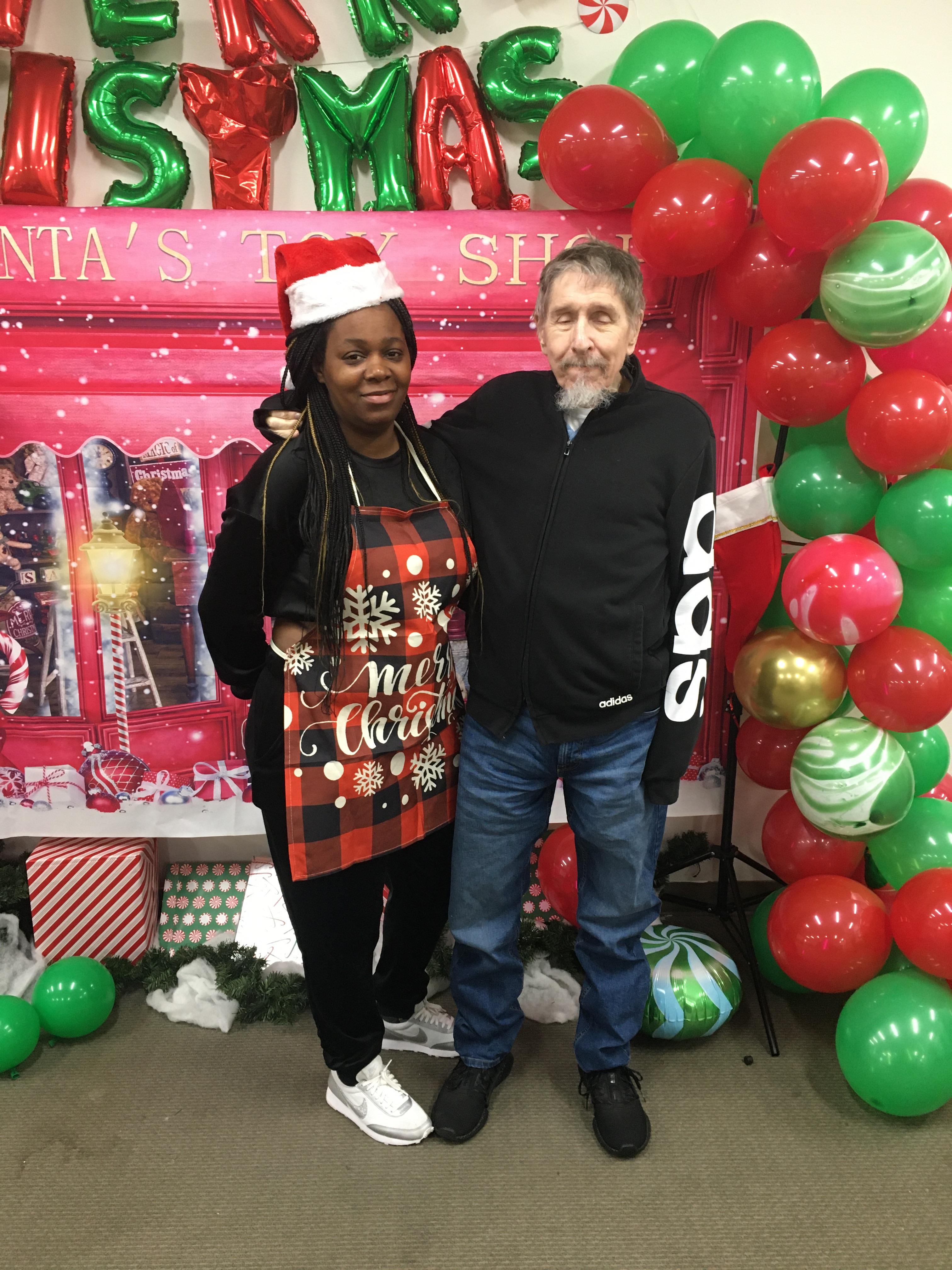 A man and woman standing next to each other