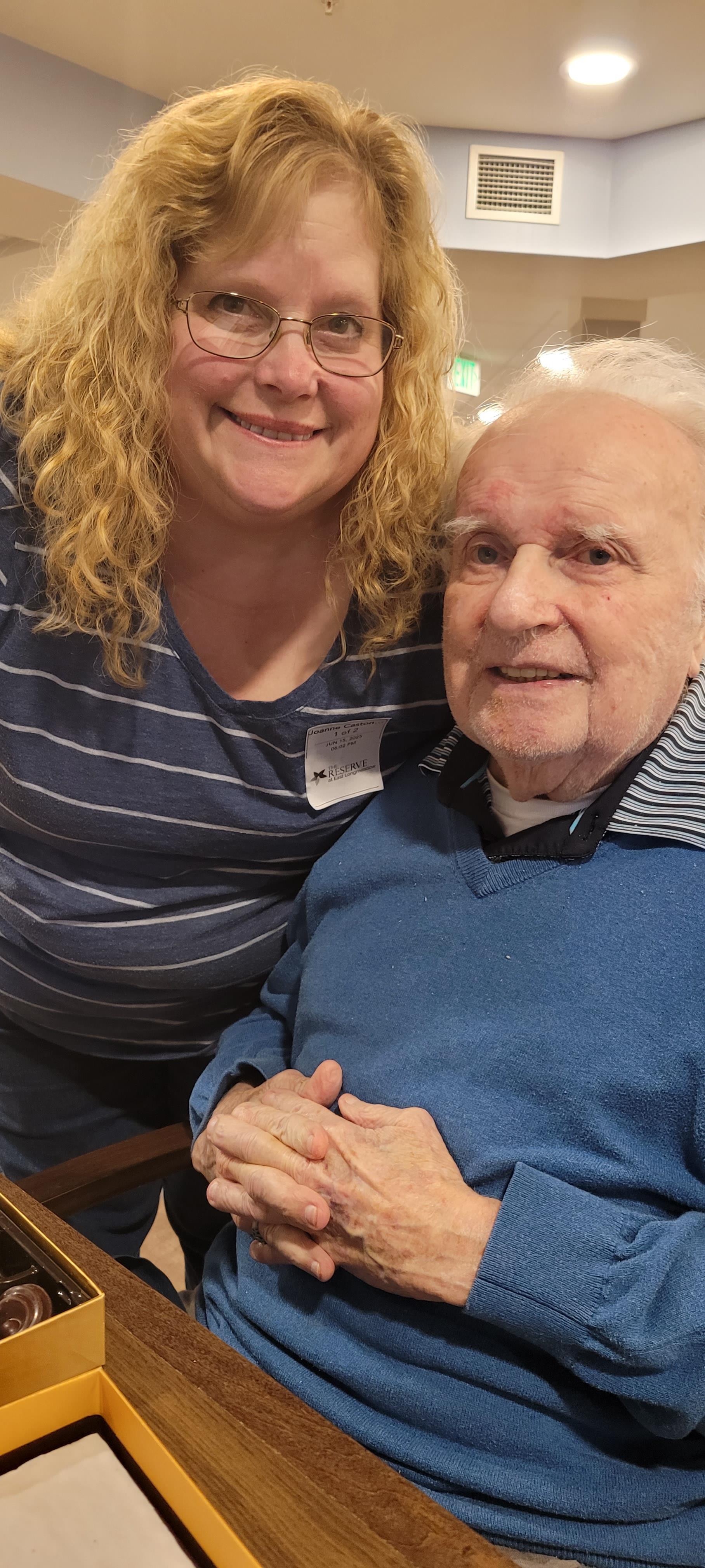 A woman and man smiling