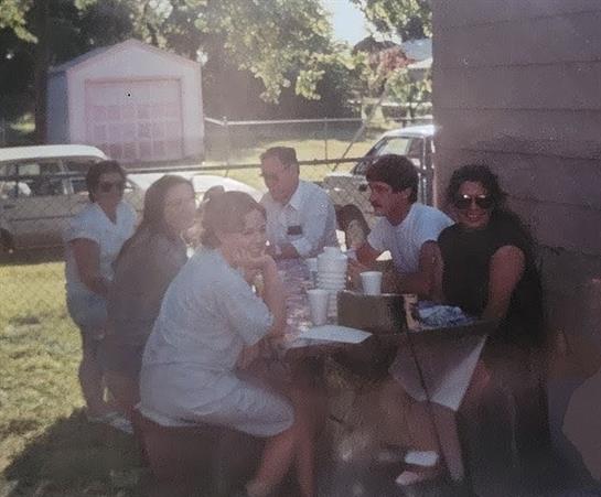 A group of people sitting at a table